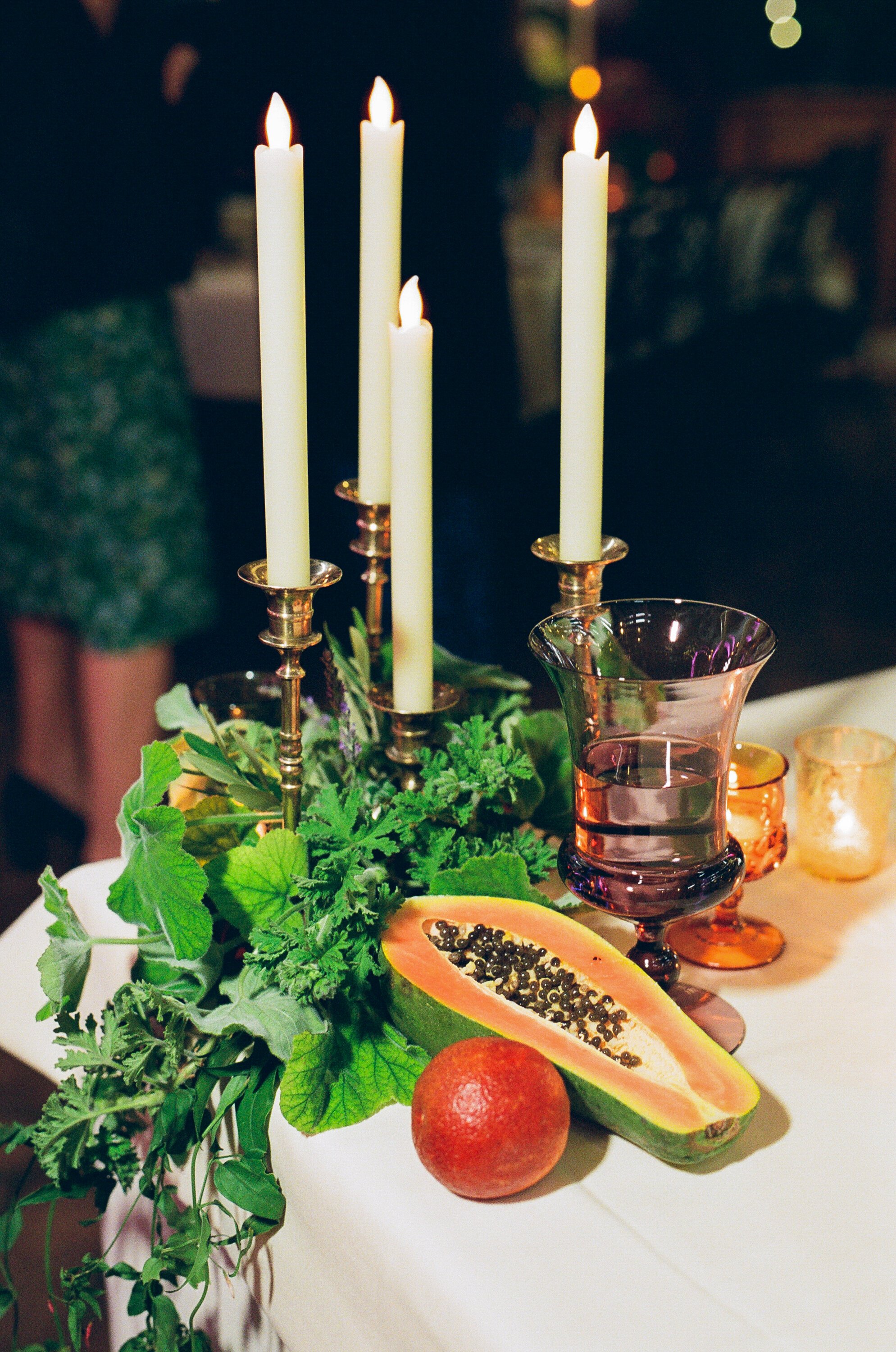 www.santabarbarawedding.com | Lerina Winter | El Paseo Restaurant | Margaret Joan Floral | Reception Table Decor Including a Papaya