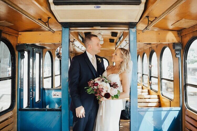 www.santabarbarawedding.com | Santa Barbara Limos | Bride and Groom on the Trolley 