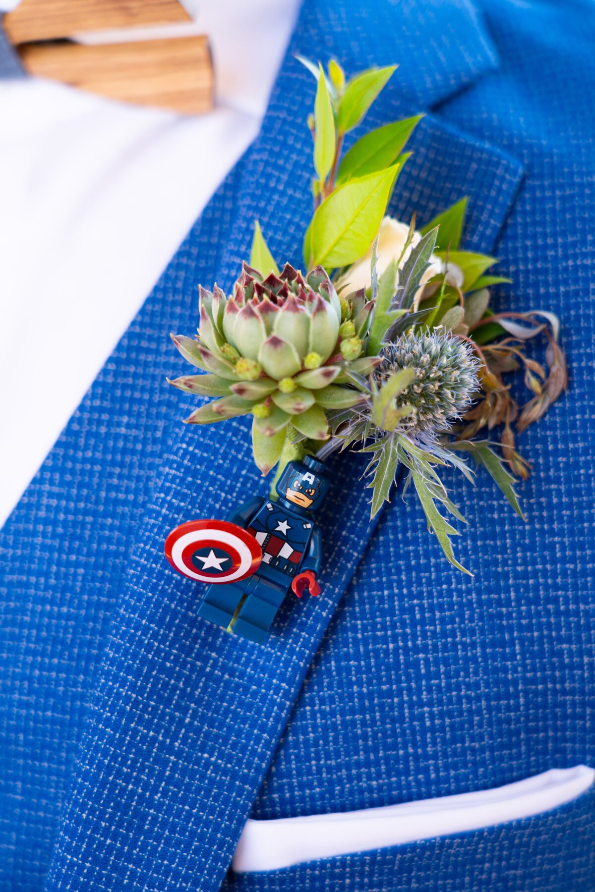 www.santabarbarawedding.com | Hilton SB Beachfront Resort | Peterson Design &amp; Photography | Kindred Weddings &amp; Events | The Twisted Twig | Groom’s Boutonniere and Captain America Lego
