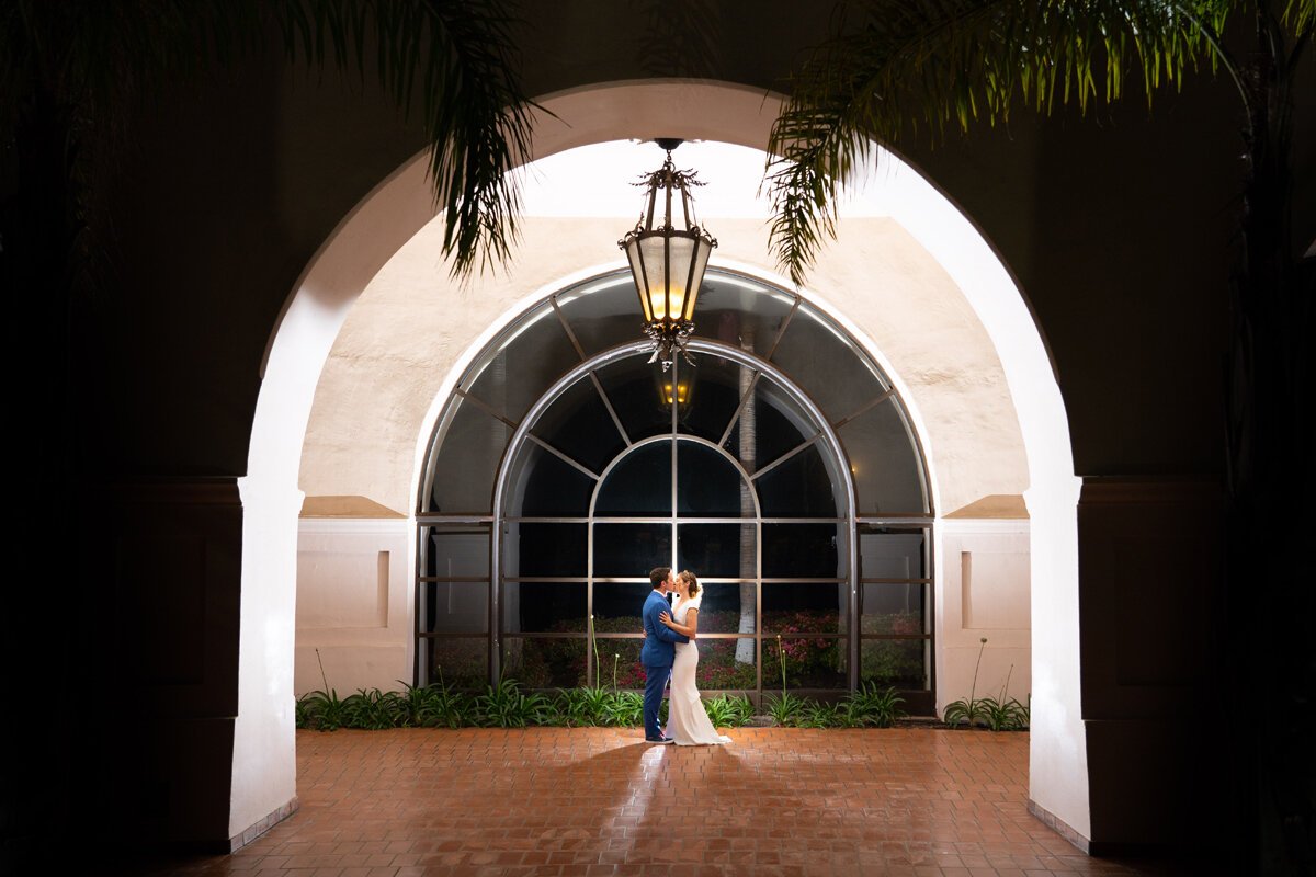 www.santabarbarawedding.com | Hilton SB Beachfront Resort | Peterson Design &amp; Photography | Kindred Weddings &amp; Events | BHLDN | Bride and Groom Kiss at Night