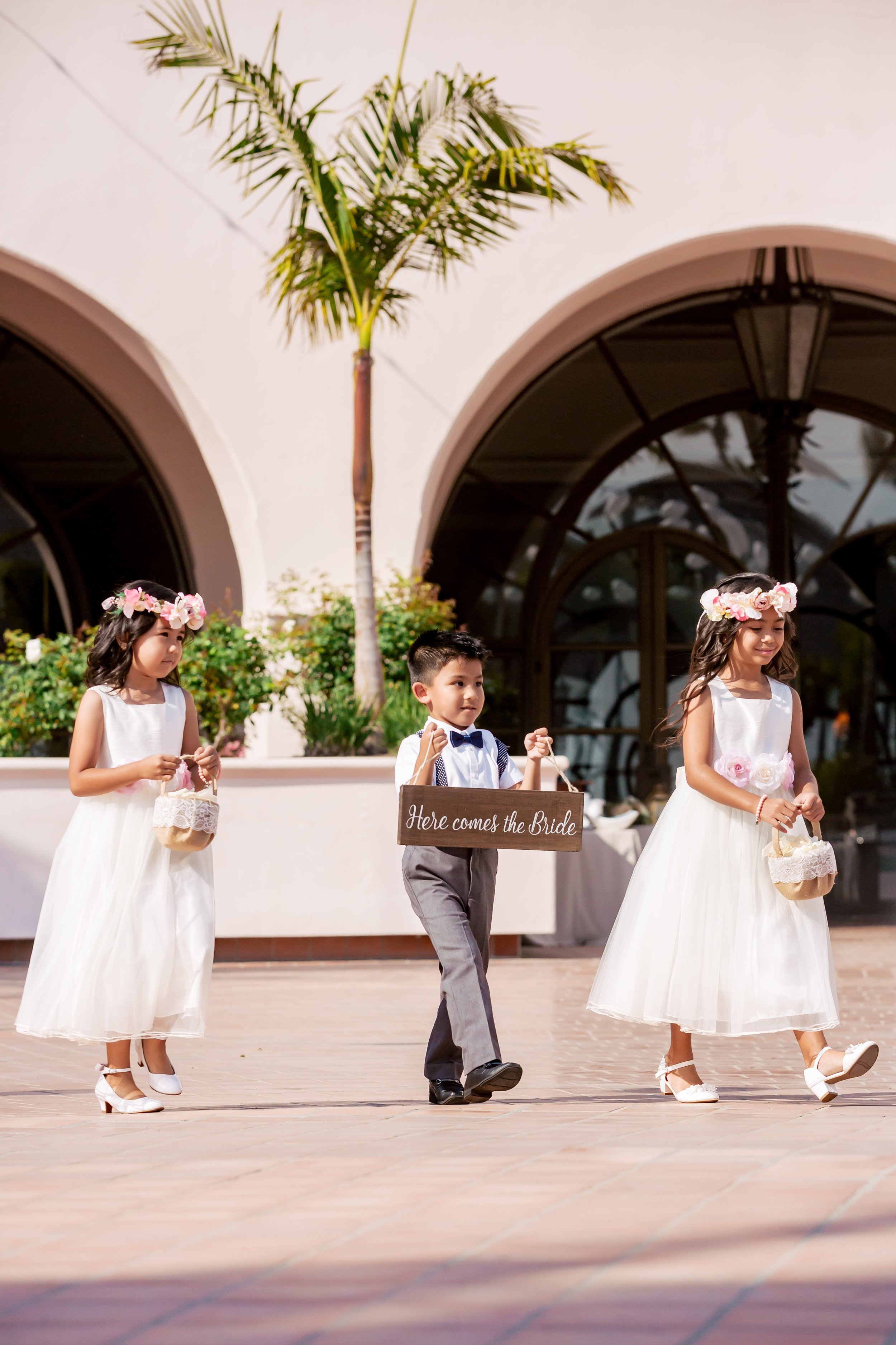 www.santabarbaraweddingstyle.com | Rewind Photography | Events by M and M | Hilton Santa Barbara | Flower Girl and Ring Bearer