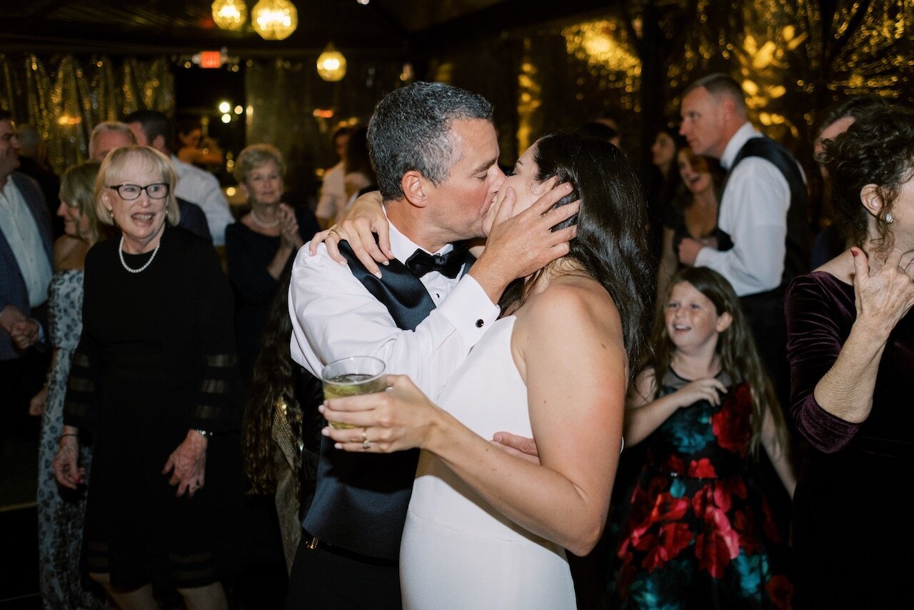 www.santabarbarawedding.com | Jenny Quicksall | Rancho Dos Pueblos | SN Events | The Replicas Music | Spark Creative Events | Romona Keveza | Simply Cocktails | Couple Share a Kiss on the Dance Floor