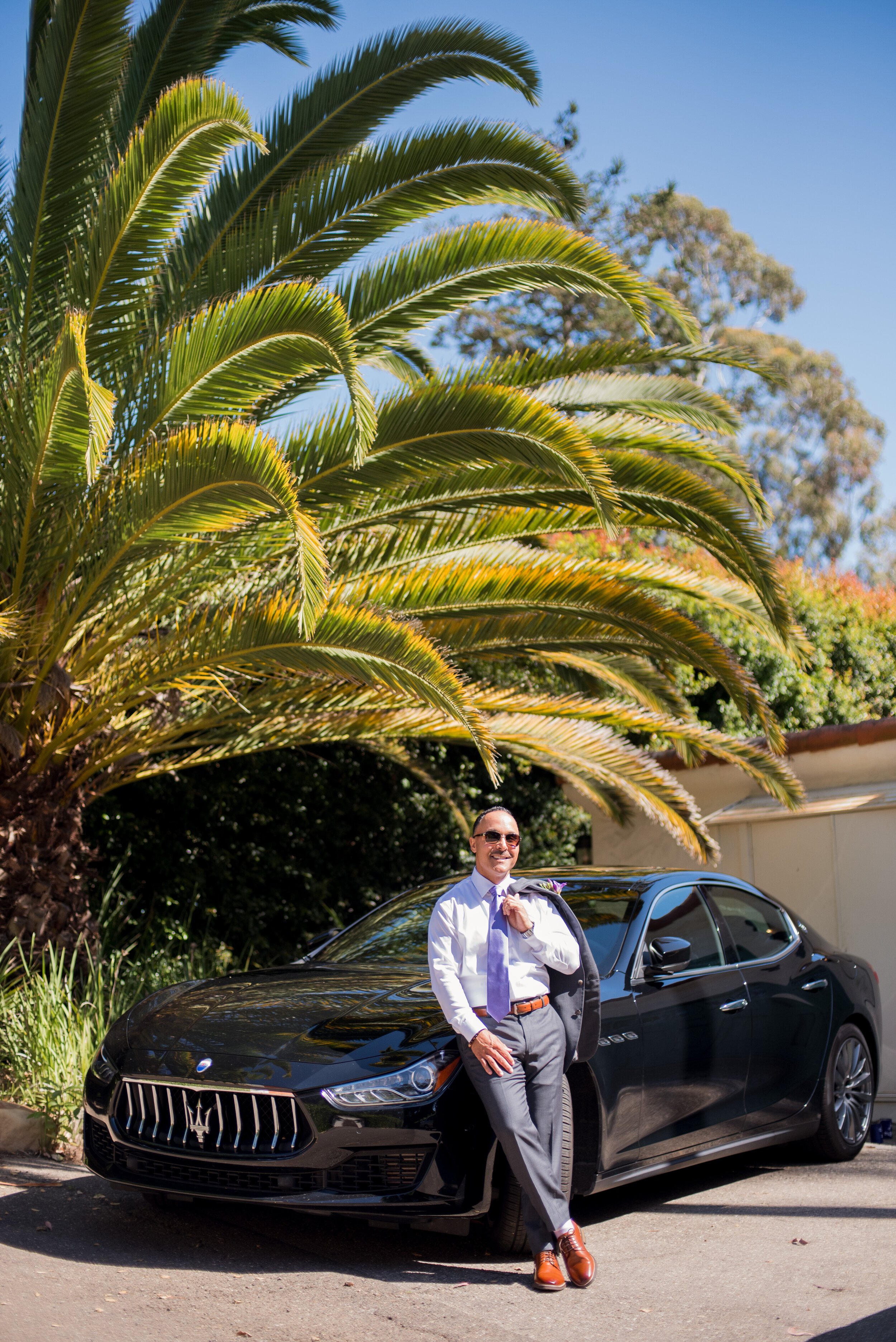 www.santabarbarawedding.com | ByCherry Photography | Riviera Productions | Groom Poses by Car