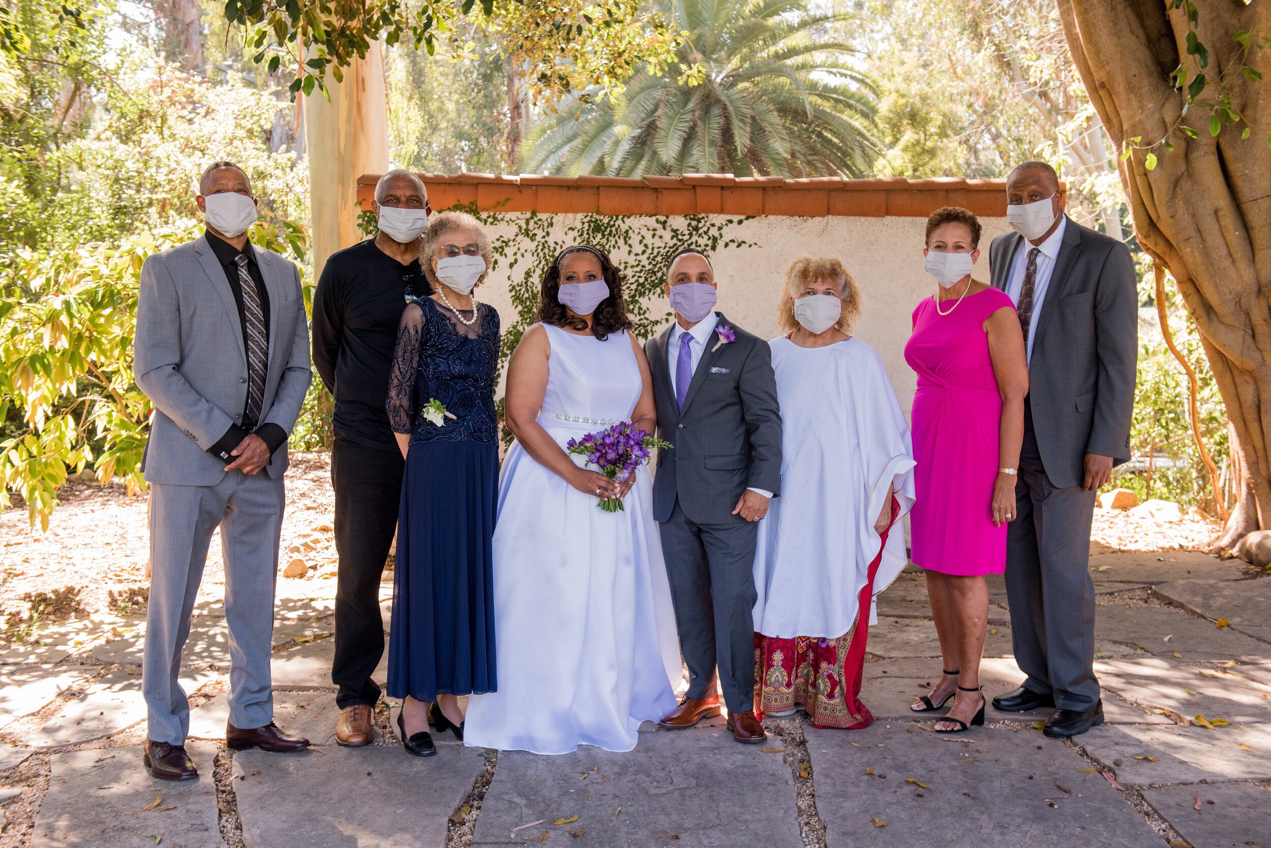 www.santabarbarawedding.com | ByCherry Photography | Riviera Productions | Couple and Close Family with Masks
