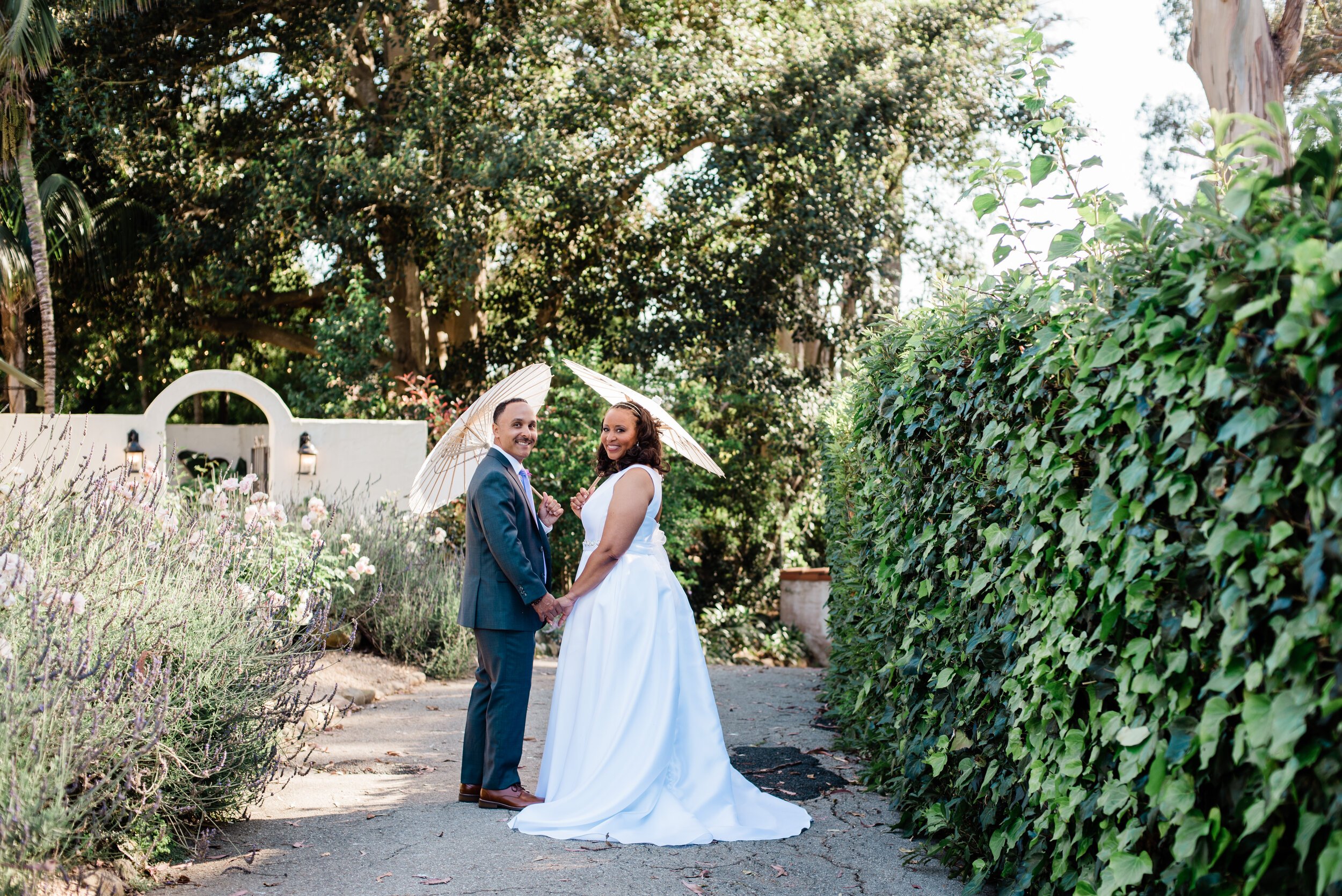 www.santabarbarawedding.com | ByCherry Photography | Riviera Productions | Bride and Groom with Just Married Umbrellas
