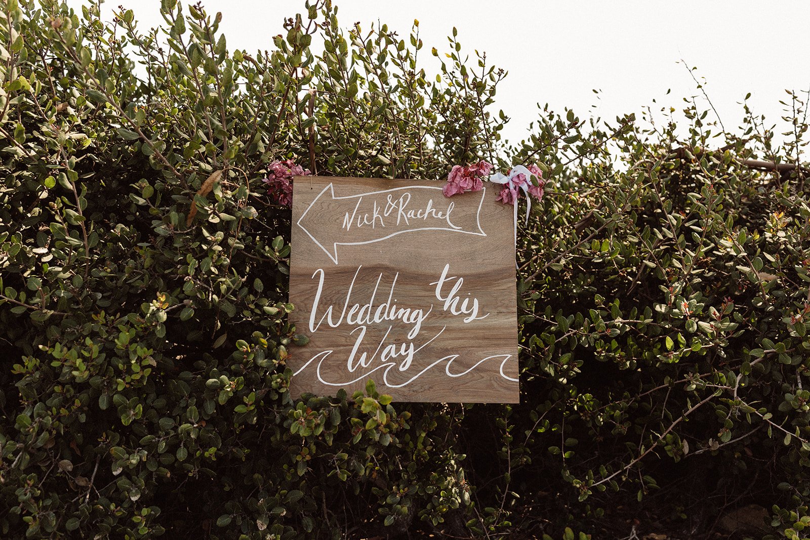 www.santabarbarawedding.com | Isabella Griffith Photography | El Capitan State Beach | KB Events | Alexis Ireland Florals | Direction Sign