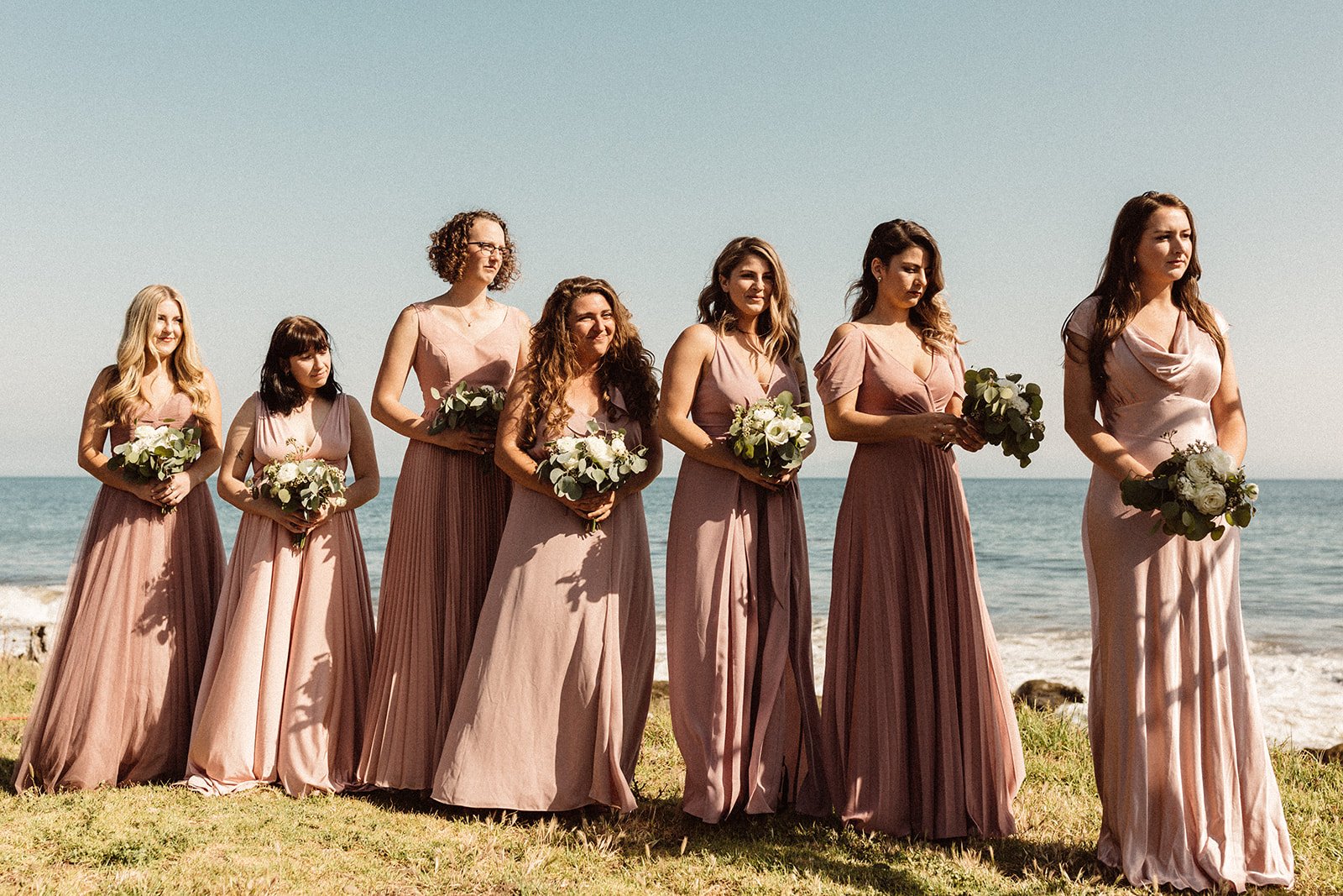 www.santabarbarawedding.com | Isabella Griffith Photography | El Capitan State Beach | KB Events | Alexis Ireland Florals | Bridesmaids at the Ceremony