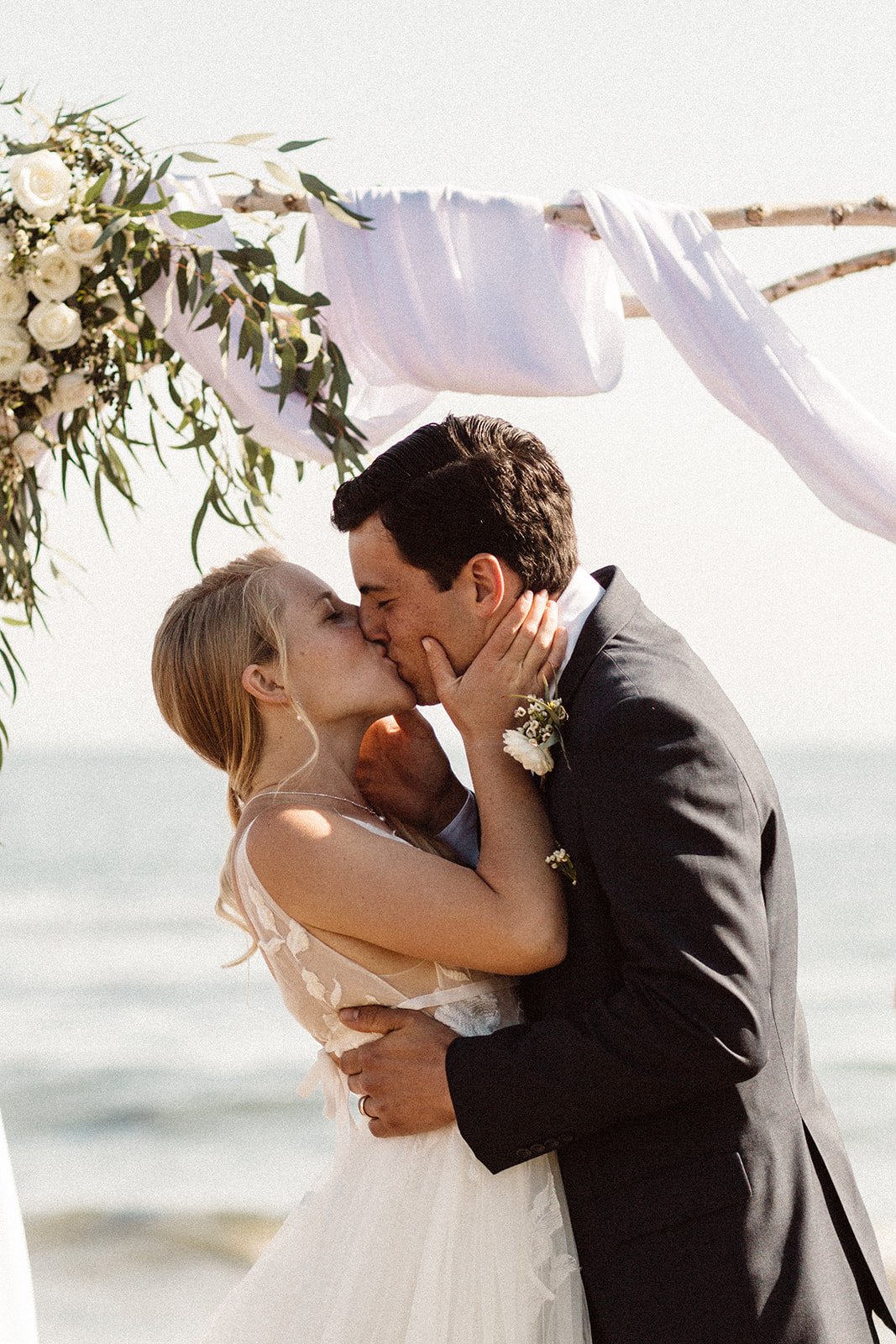 www.santabarbarawedding.com | Isabella Griffith Photography | El Capitan State Beach | KB Events | Alexis Ireland Florals | Bride and Groom First Kiss