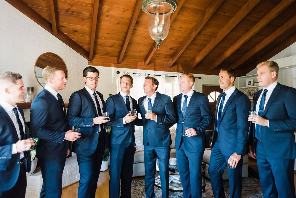 www.santabarbarawedding.com | SB Historical Museum | Donna Romani | Julie Shuford Photography | Groom Shares a Drink with Groomsmen