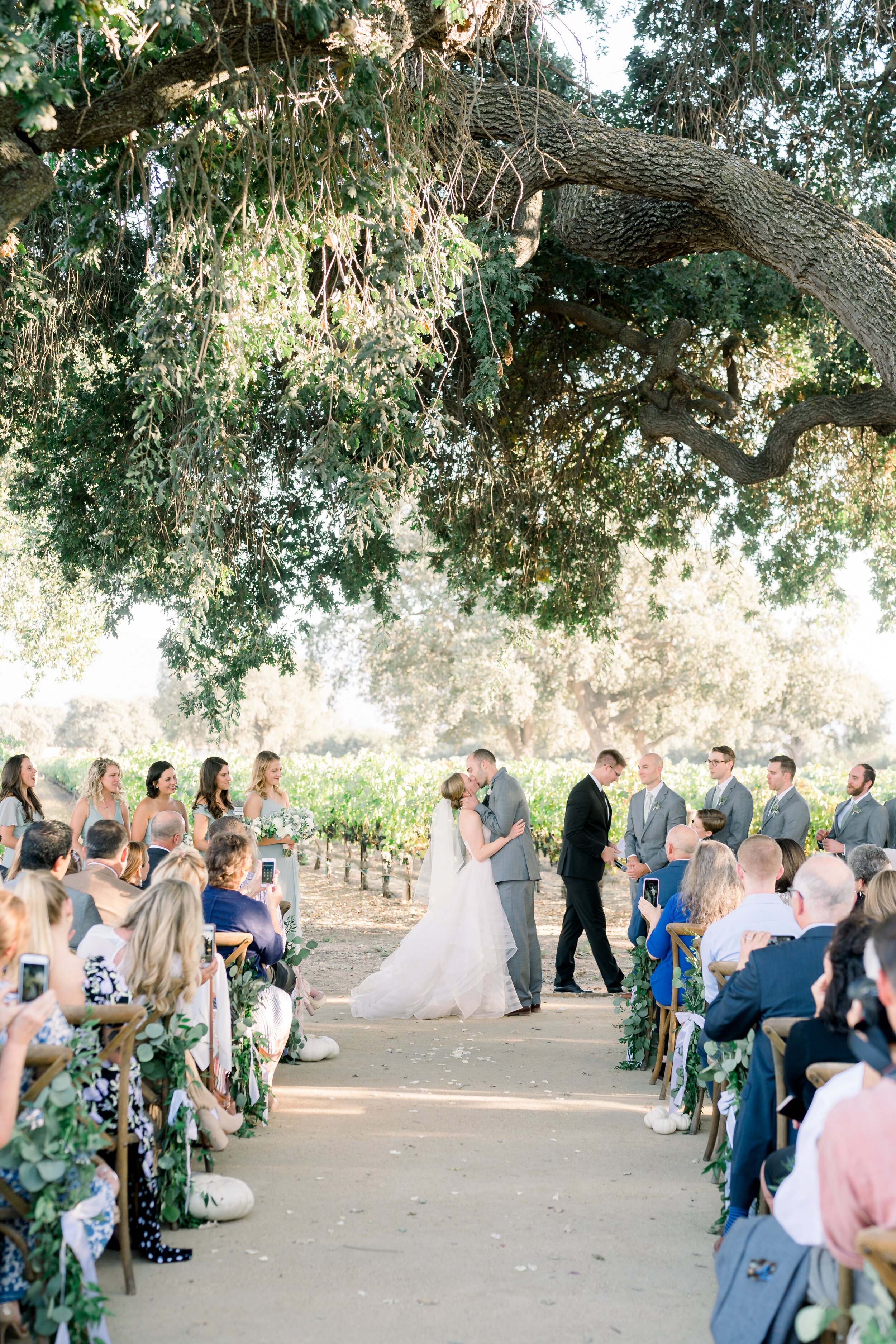 www.santabarbarawedding.com | We Heart Photography | Roblar Winery | Elizabeth Ginder Events | Alexis Ireland Florals | Camaille Victoria | Mishay Salon | Bride and Groom’s First Kiss