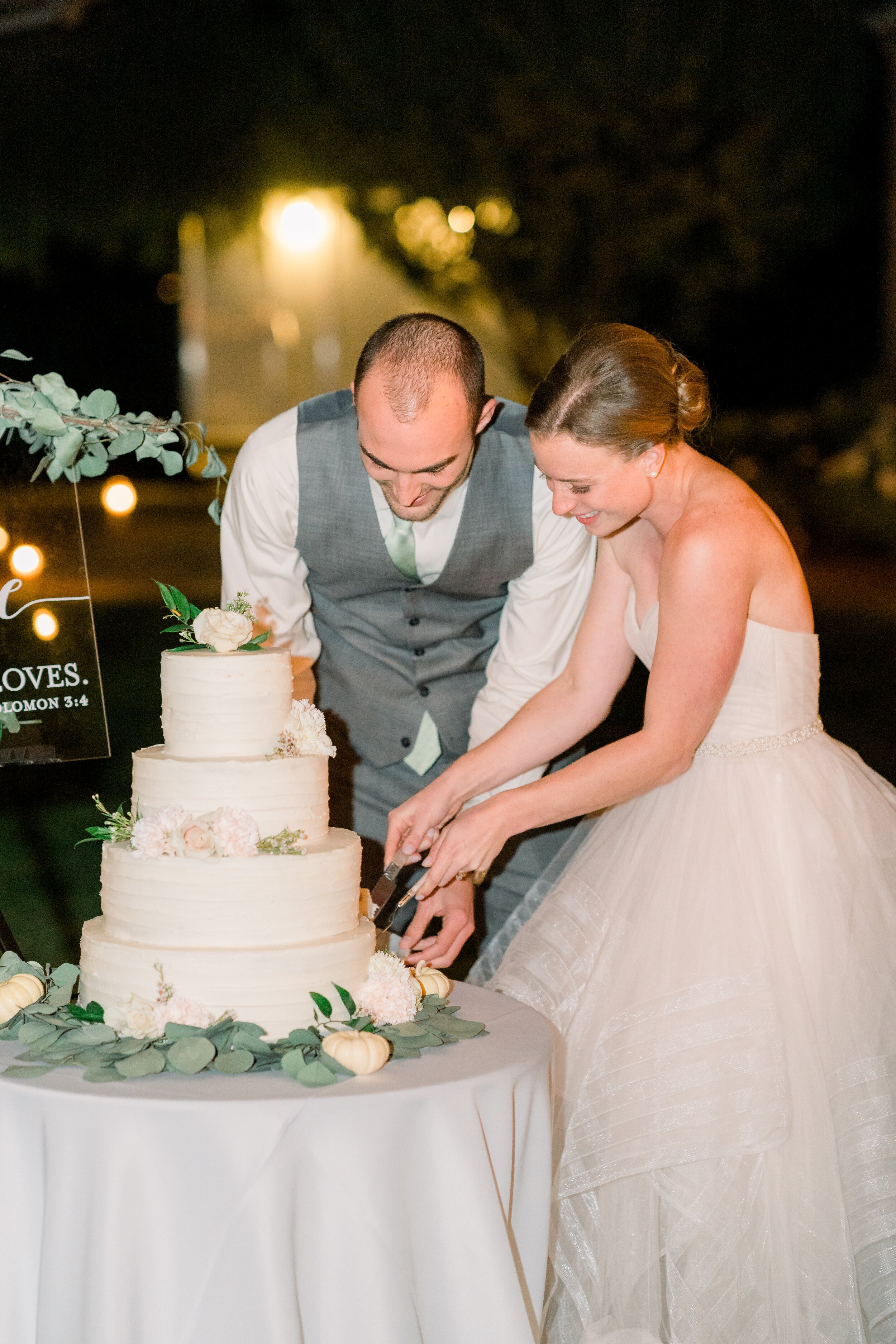 www.santabarbarawedding.com | We Heart Photography | Roblar Winery | Elizabeth Ginder Events | Alexis Ireland Florals | Bride and Groom Cut the Wedding Cake