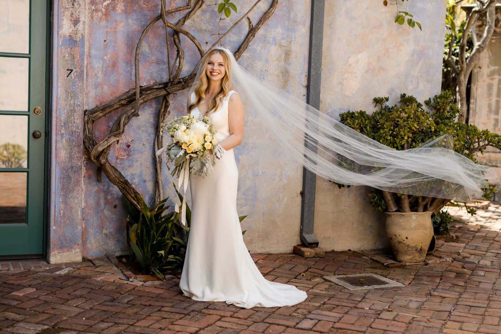 www.santabarbarawedding.com | Kaitie Brainerd Photography | Casa de la Guerra | DPfilms Productions | Janice Ruiz | Theia | Bride with Bouquet Before the Ceremony 