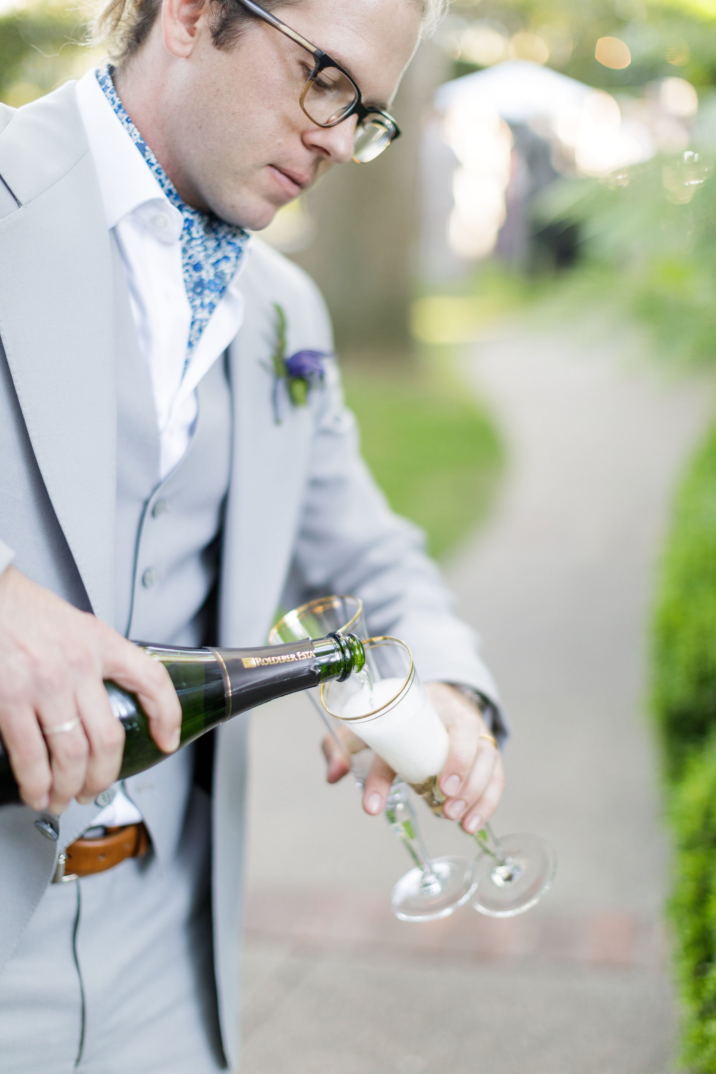 www.santabarbarawedding.com | Kiel Rucker | Ann Johnson Events | Simpson House Inn | The Poppy Pod | Groom Pouring a Drink