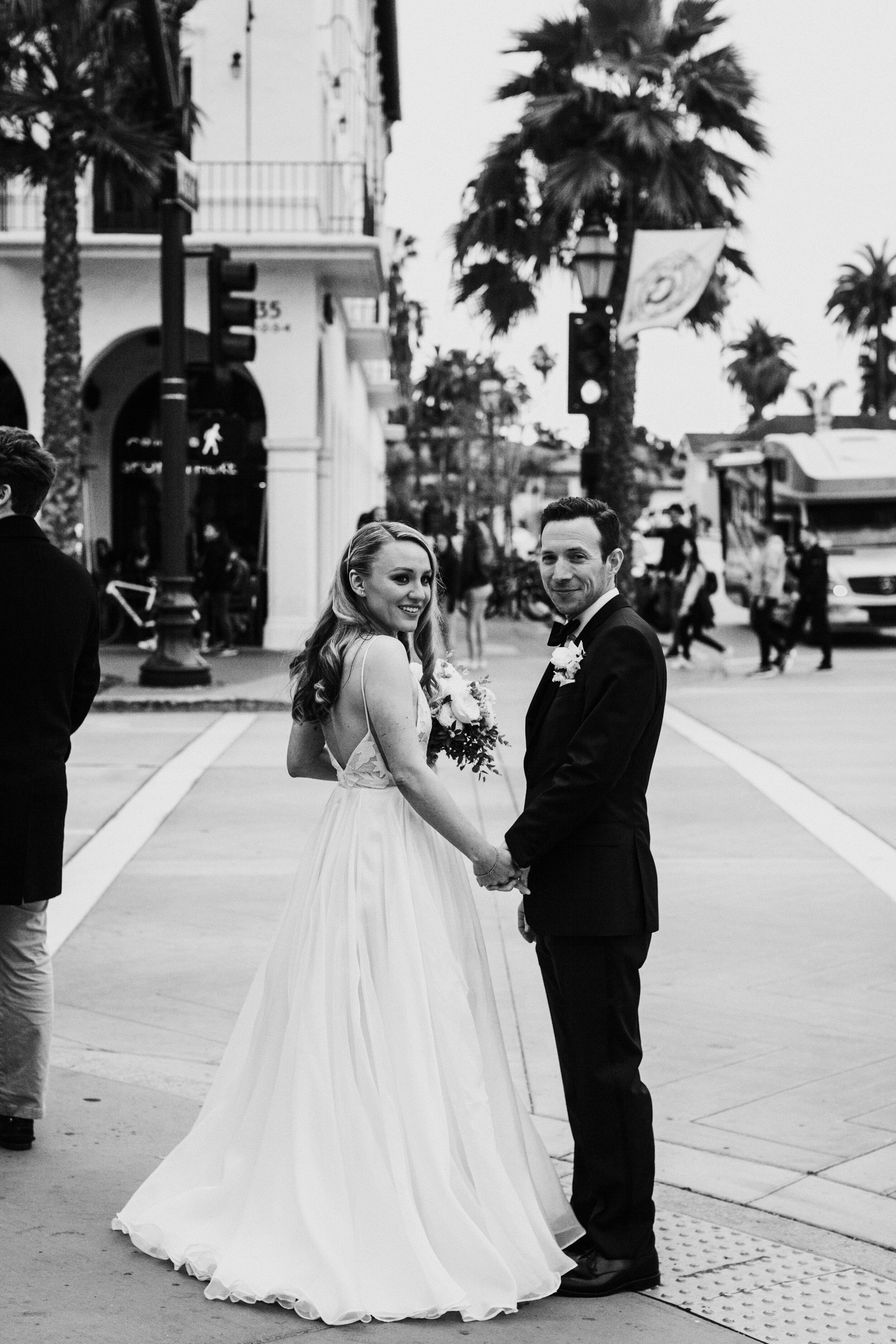 www.santabarbarawedding.com | Hotel Californian | XOXO Weddings | Alexandra Wallace | Monica Vasquez | Sara Seven | Louloudi Design | Bride and Groom on the Street Outside the Hotel
