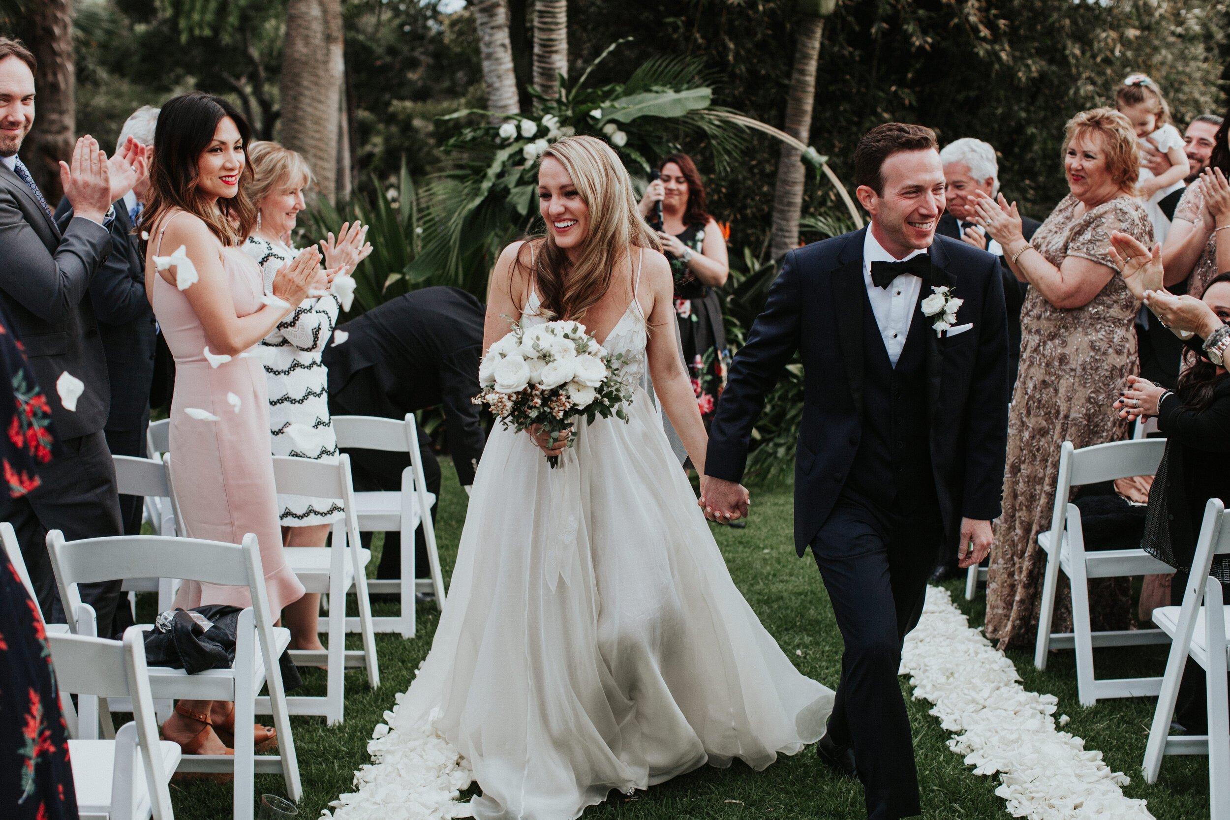 www.santabarbarawedding.com | Santa Barbara Zoo | XOXO Weddings | Alexandra Wallace | Louloudi Design | Crowd Theory Entertainment | Geoff Rivers | Bride and Groom Exiting the Ceremony