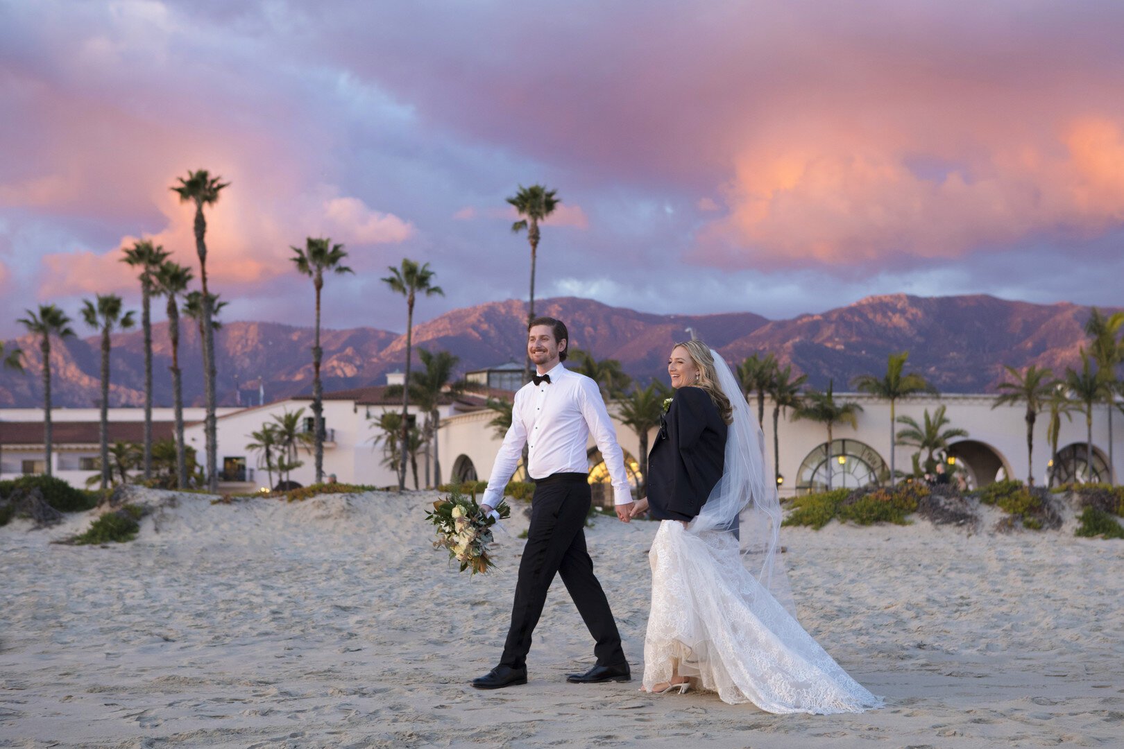 www.santabarbarawedding.com | ByCherry Photography | Hilton Santa Barbara Beachfront Resort | Our Lady of Mount Carmel | Dulce Dia Events | Santa Barbara Trolley | The Couple Strolls on the Beach 