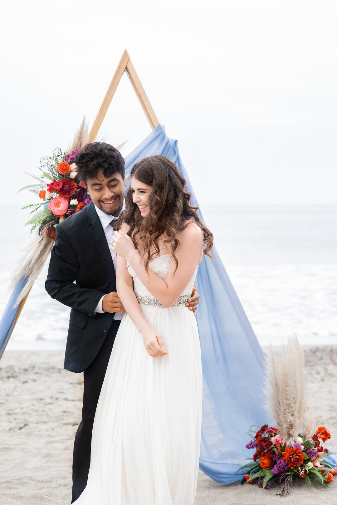  www.santabarbaraweddings.com | Staci &amp; Michael Photography | Hearst Beach | Mauna Florist | Linens: Pier 1 Imports | Wedding Gown: Winnie Couture | Bridal Beauty: Madi Faye Makeup