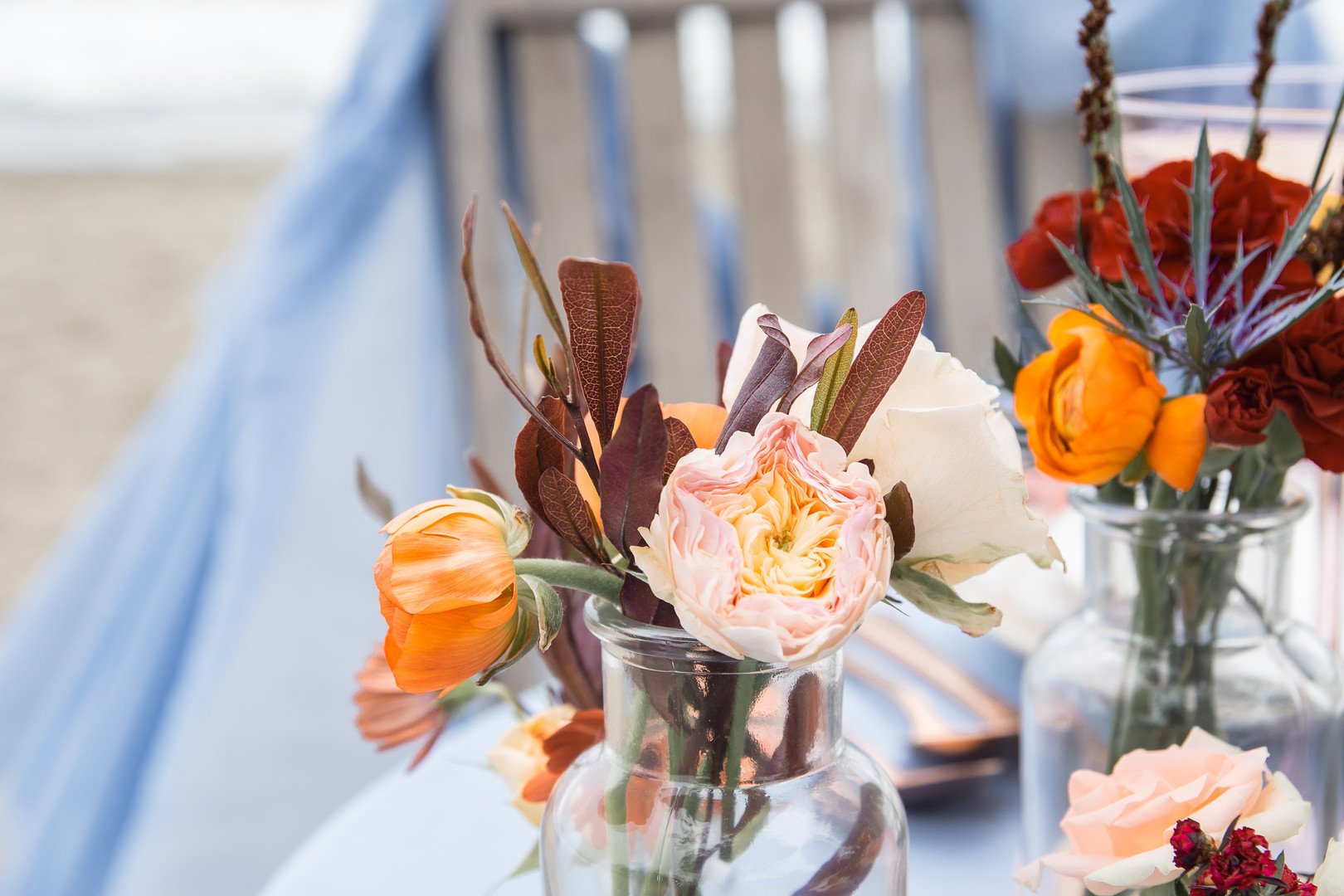 www.santabarbaraweddings.com | Staci &amp; Michael Photography | Hearst Beach | Mauna Florist | Linens: Pier 1 Imports | Decor: World Market | Reception Table