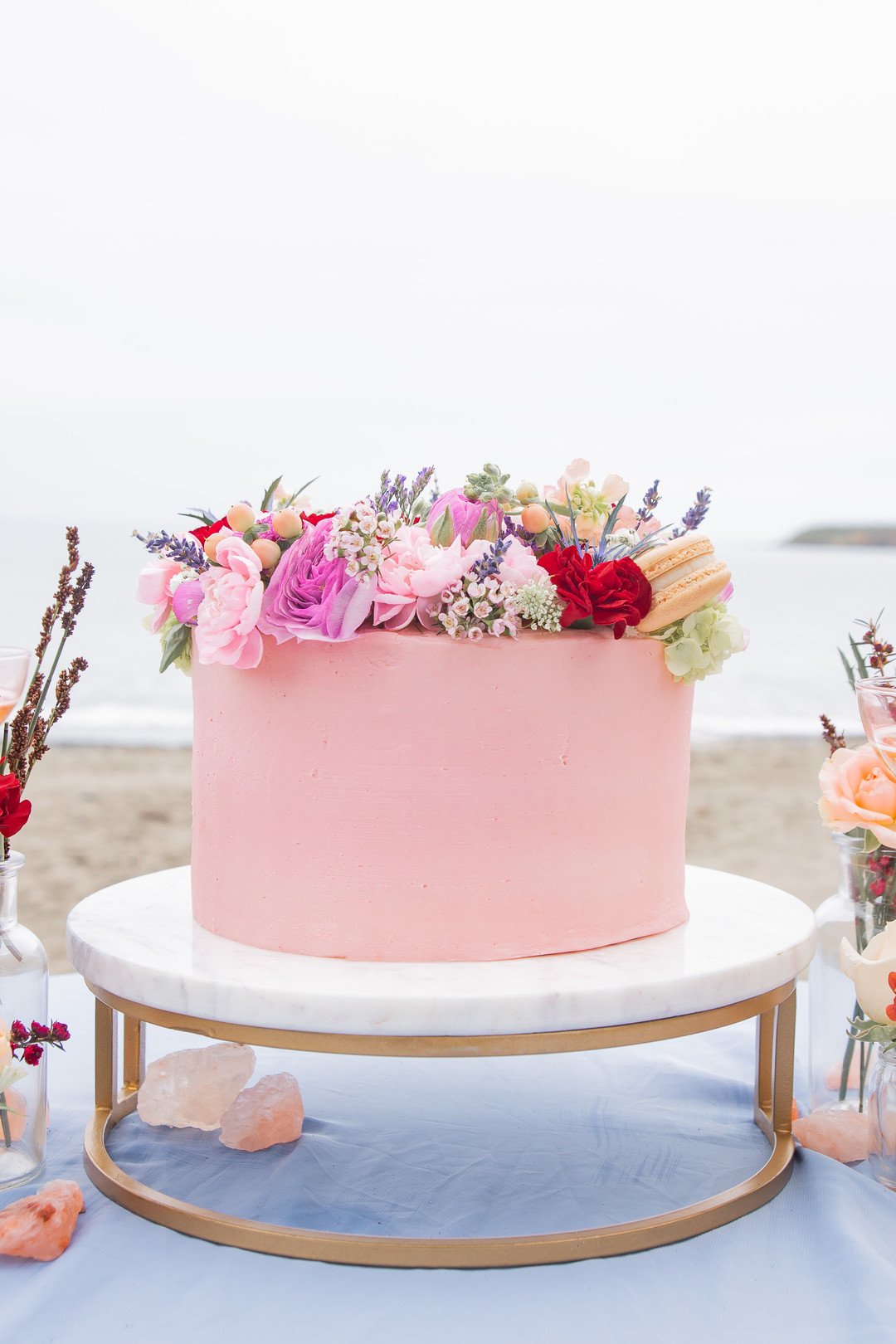 www.santabarbaraweddings.com | Staci &amp; Michael Photography | Hearst Beach | Mauna Florist | Linens: Pier 1 Imports | Decor: World Market | Wedding Cake: Bri’s Sweet Retreat | Reception Table 