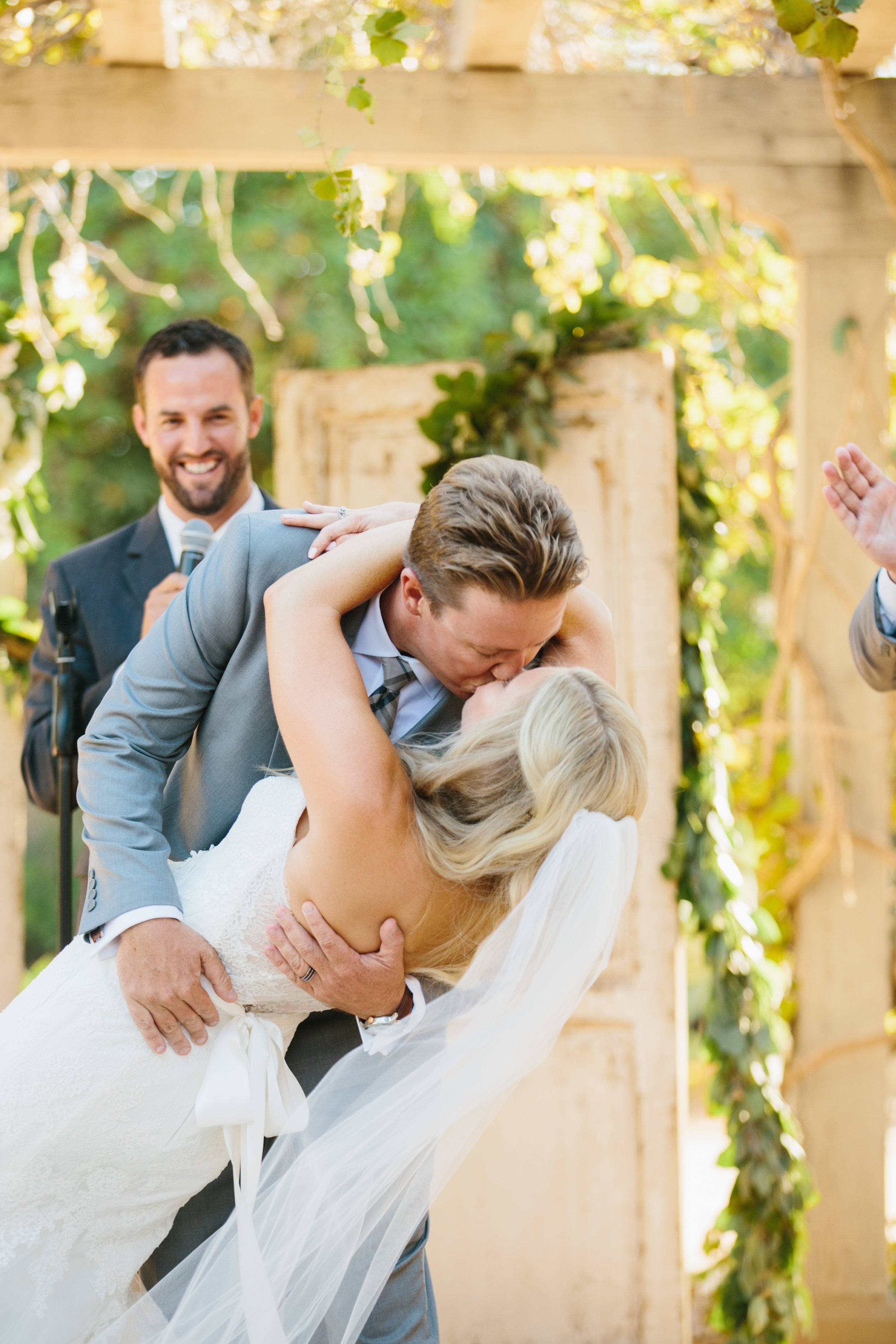 www.santabarbarawedding.com | The Sanadas | Santa Barbara Historical Museum | Joelle Charming | These Buds A Blooming | Town and Country Event Rentals | Bride and Groom Kiss at The Ceremony