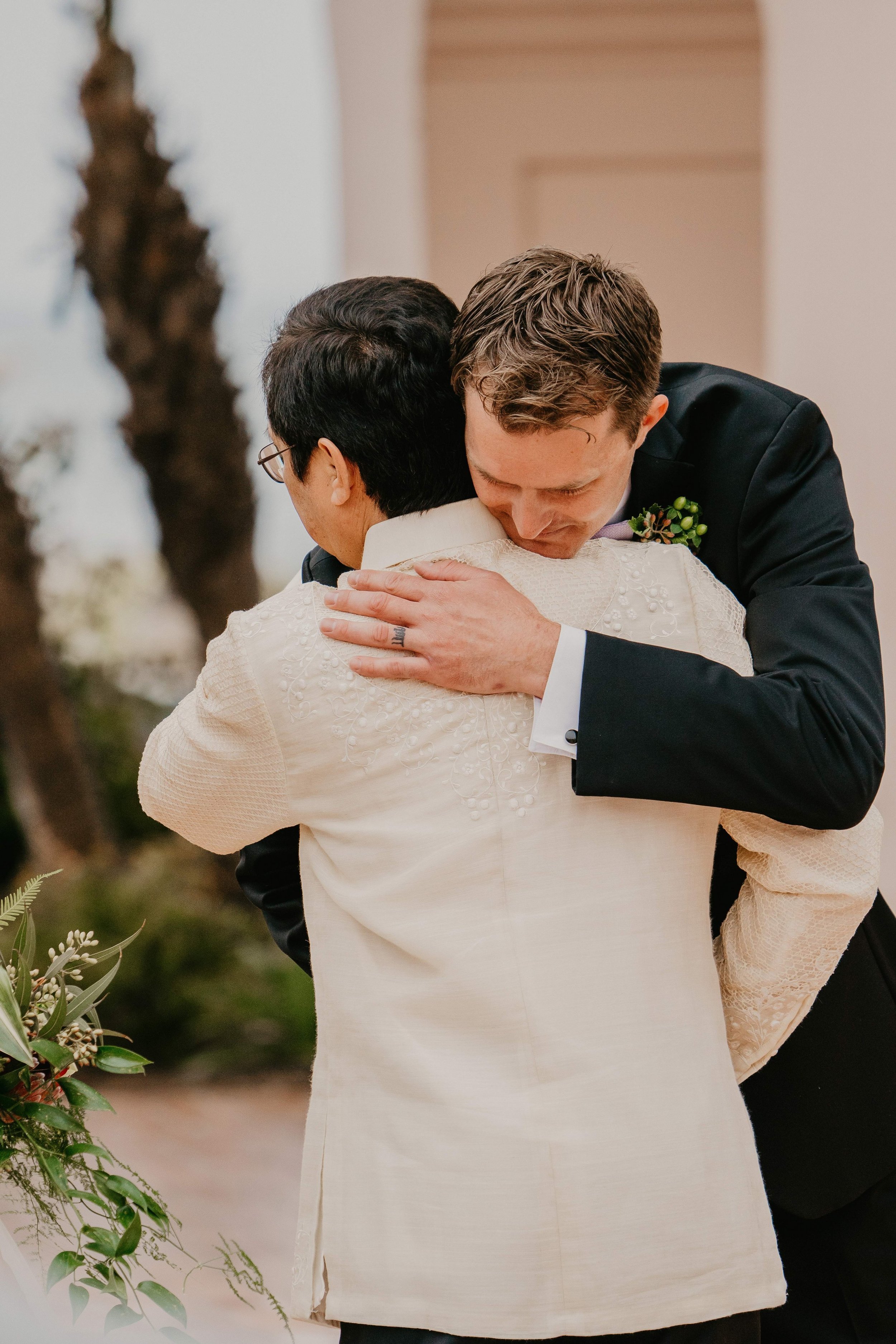 www.santabarbarawedding.com | Candice Marie Photography | Hilton Santa Barbara Beachfront Resort | Dalina Klan | Once in a Lifetime Weddings | Anthony Francisco | Groom Hugs Bride’s Father