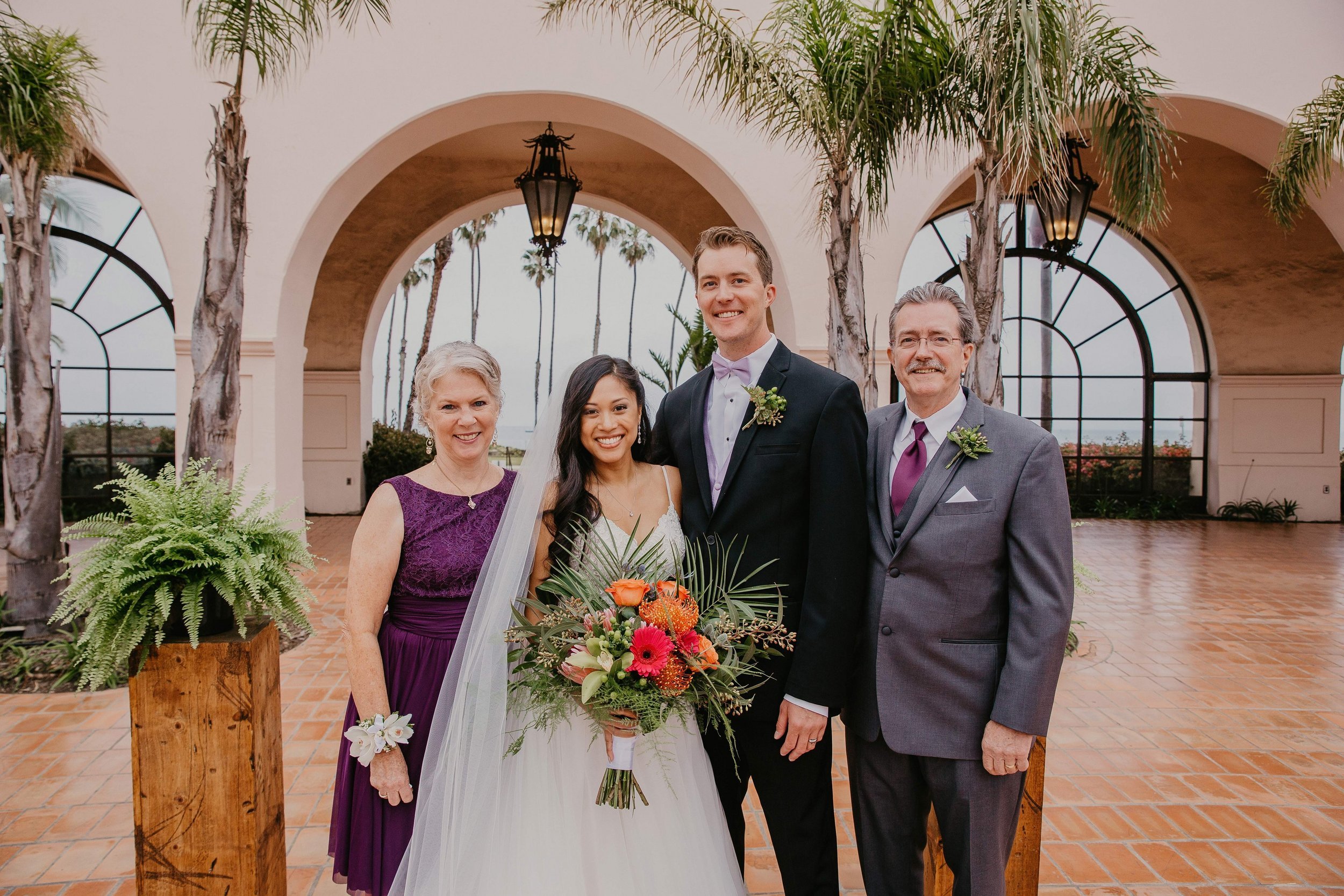 www.santabarbarawedding.com | Candice Marie Photography | Hilton Santa Barbara Beachfront Resort | Dalina Klan | Once in a Lifetime Weddings | Alpha Floral | Bride and Groom with Groom’s Parents