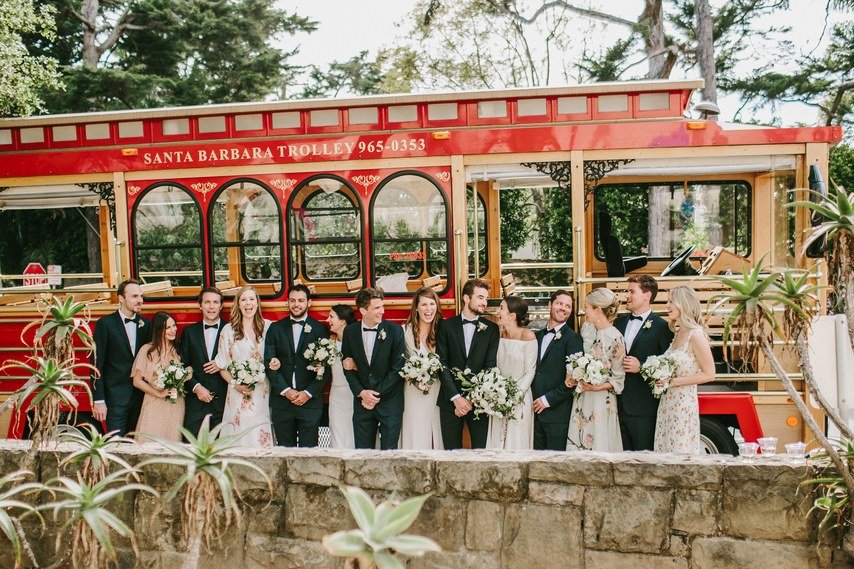 www.santabarbarawedding.com | WildWhim Design + Photography | Our Lady of Mount Carmel | Ann Johnson Events | Bloom Floral and Foliage | Santa Barbara Trolley | Bridal Party With Trolley