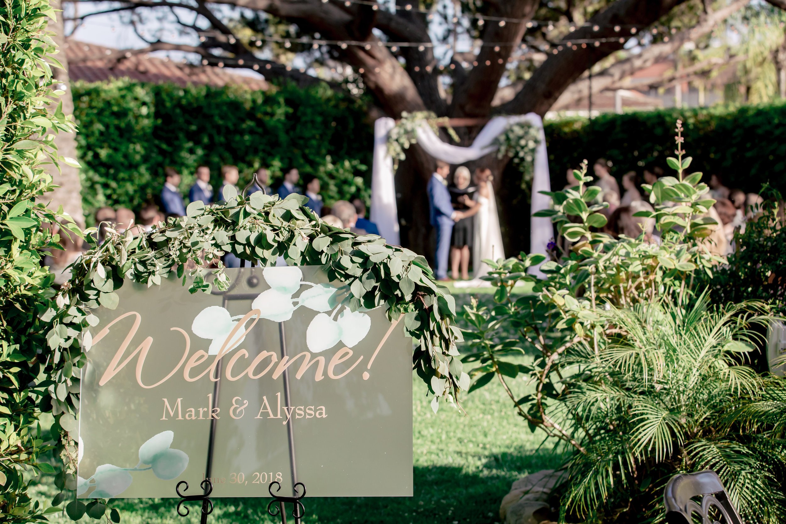 www.santabarbarawedding.com | Rewind Photography | Riviera Mansion | Alegria by Design | Margaret Joan Florals | Just-4-Fun Party Rentals | Ceremony Welcome Sign