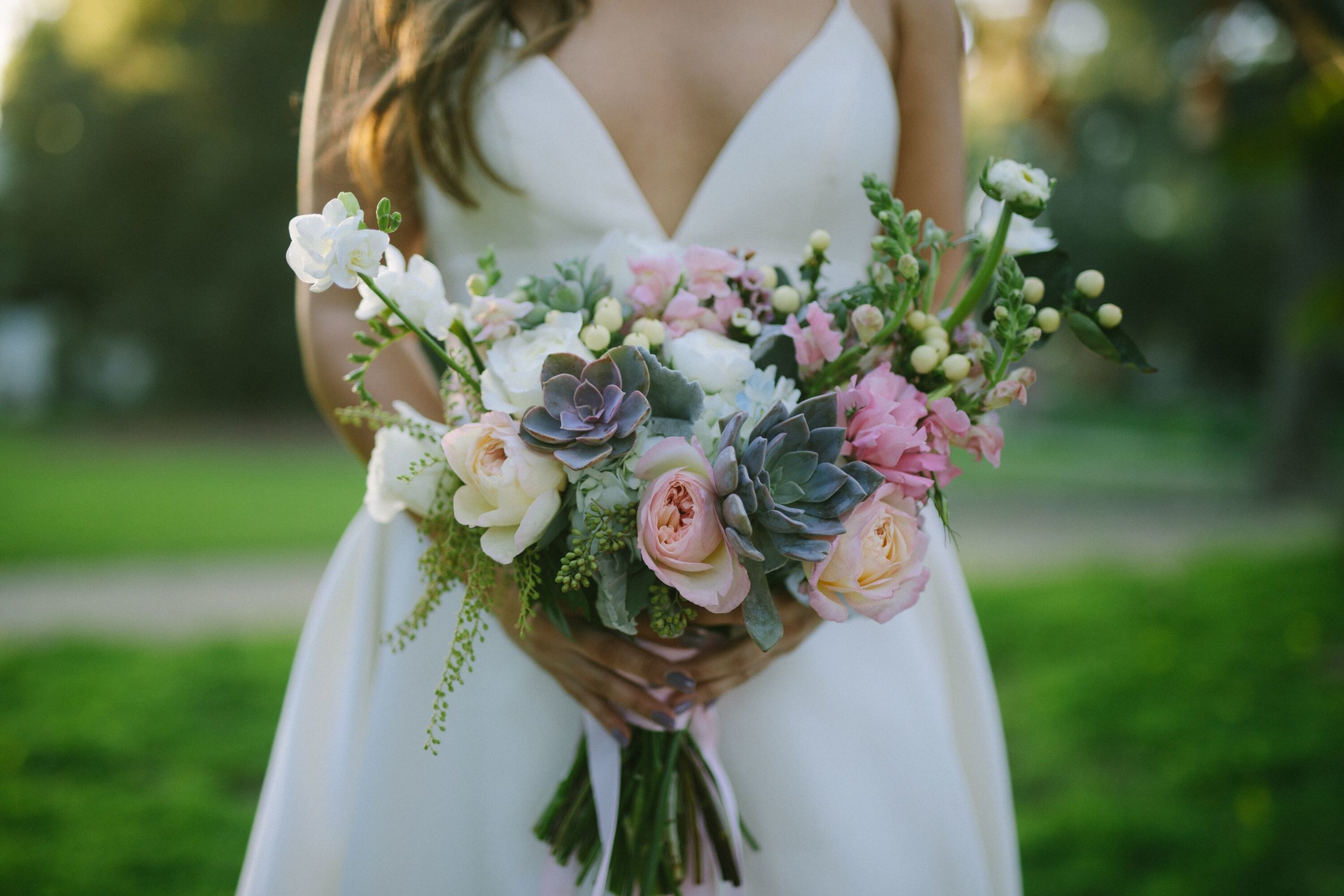 www.santabarbarawedding.com | Photographer: Patrick Ang of Forever Rooted Films | Venue: Rancho La Patera &amp; Stow House | Wedding Planner: Elyse Rowen of Elyse Events | Bride Holding Bouquet