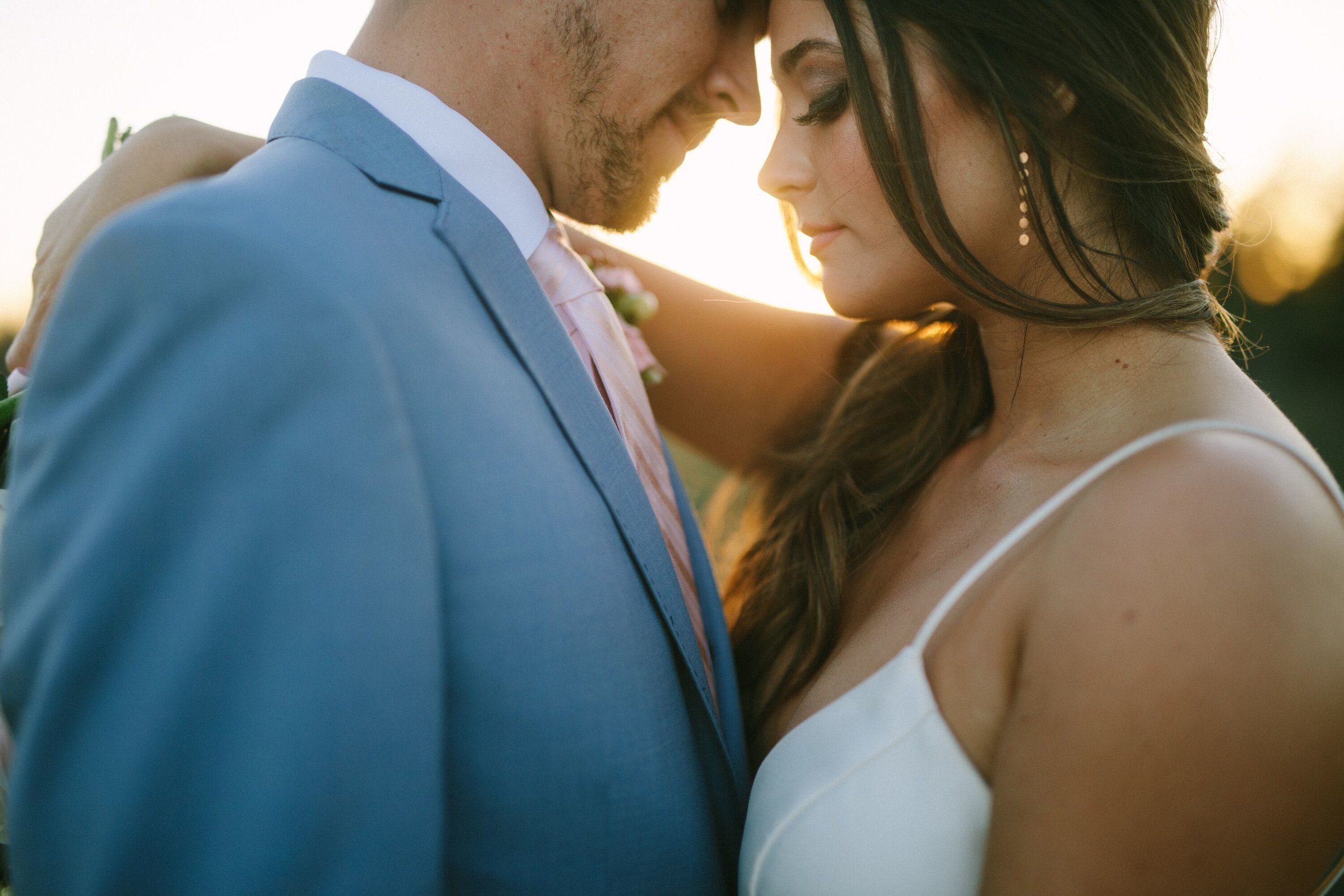 www.santabarbarawedding.com | Photographer: Patrick Ang | Venue: Rancho La Patera &amp; Stow House | Wedding Planner: Elyse Rowen of Elyse Events | Bride and Groom Sunset Closeup