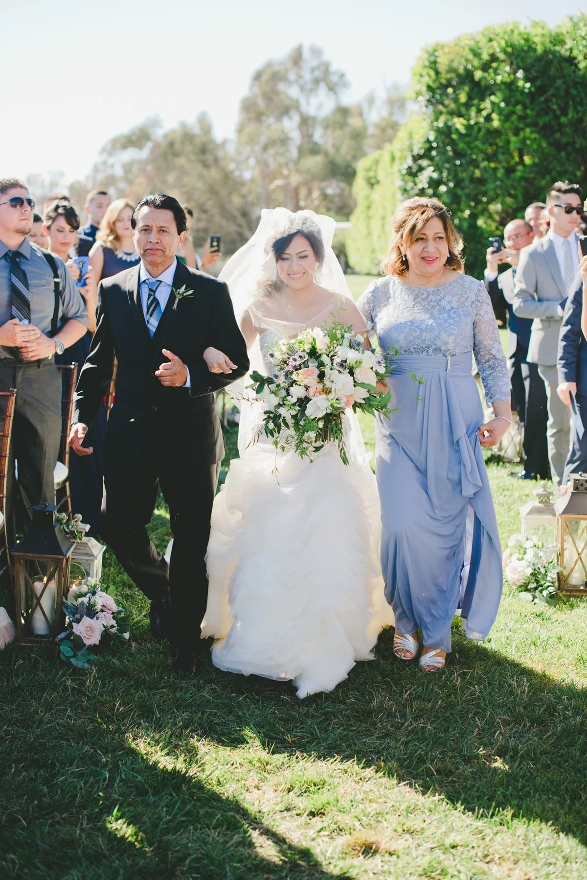 www.santabarbarawedding.com | One Love Photography | Bacara Resort &amp; Spa | Alegria by Design | Enchanted Garden Floral Design | Mother and Father Walk Bride Down The Aisle
