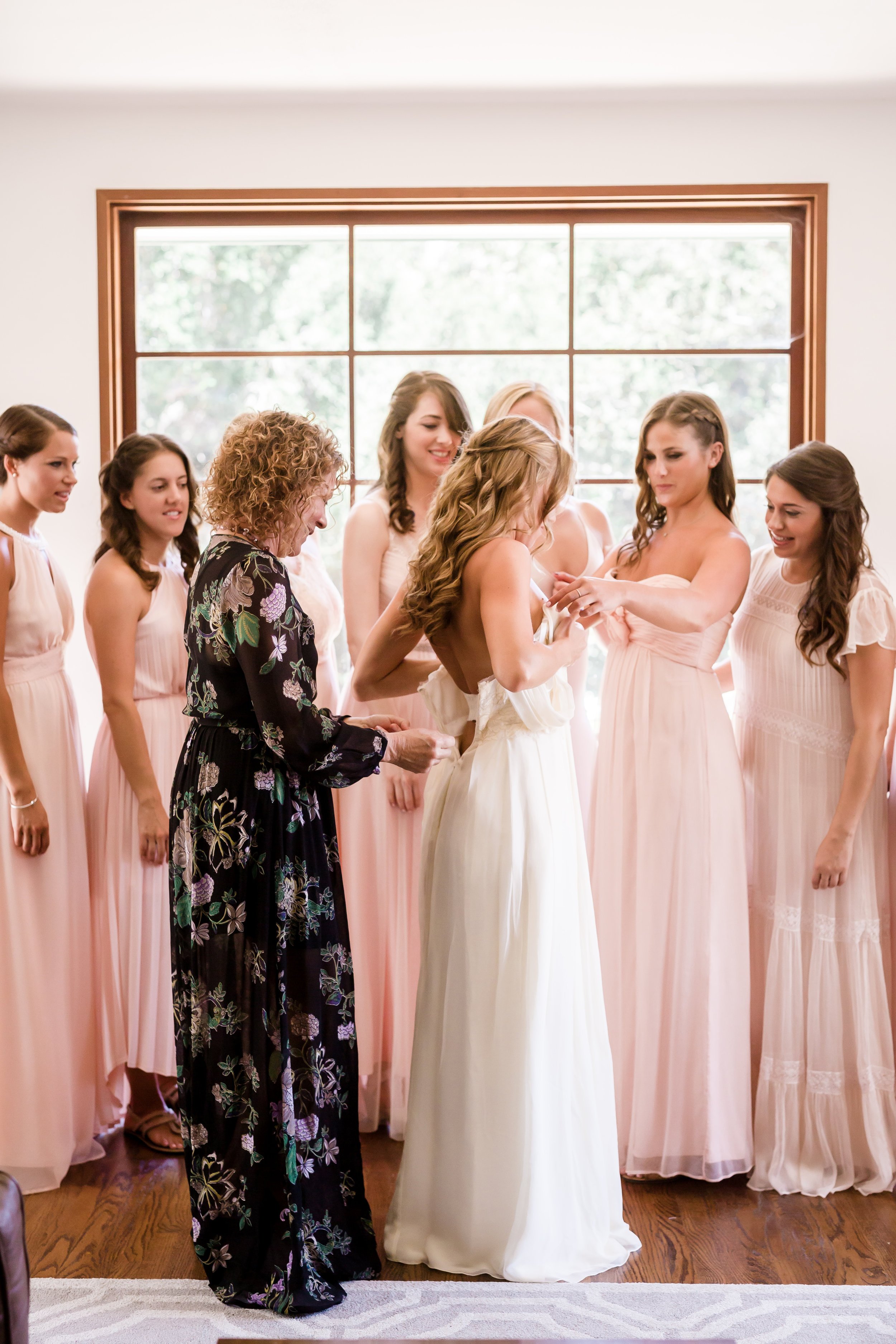 www.santabarbarawedding.com | Rewind Photography | Santa Barbara Polo and Racquet Club | Onyx and Redwood | Ella &amp; Louie Floral Studio| Mother Helps Bride with Wedding Dress