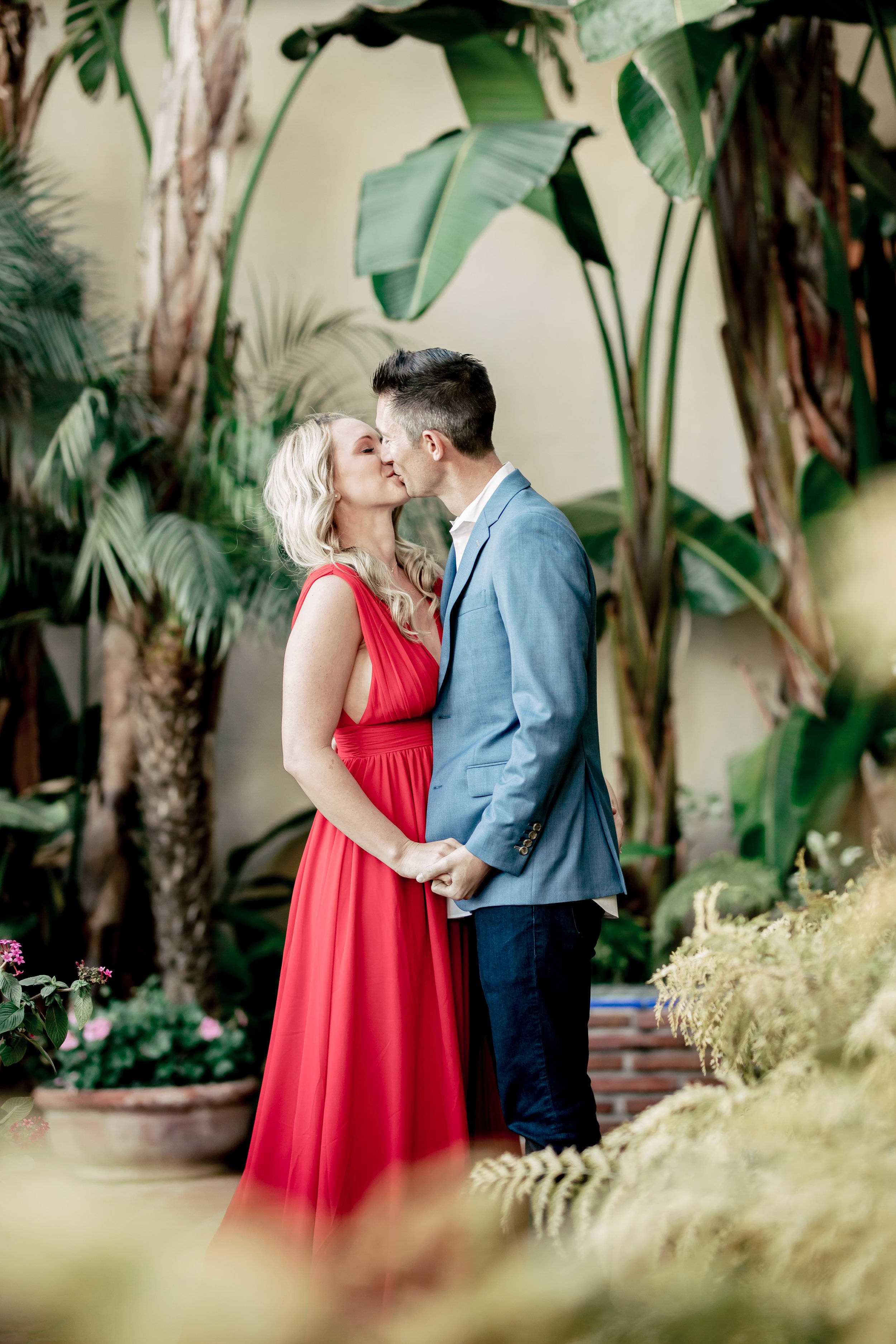 santabarbarawedding.com | Rewind Photography | Butterfly Beach | Engaged Couple In Tropical Garden