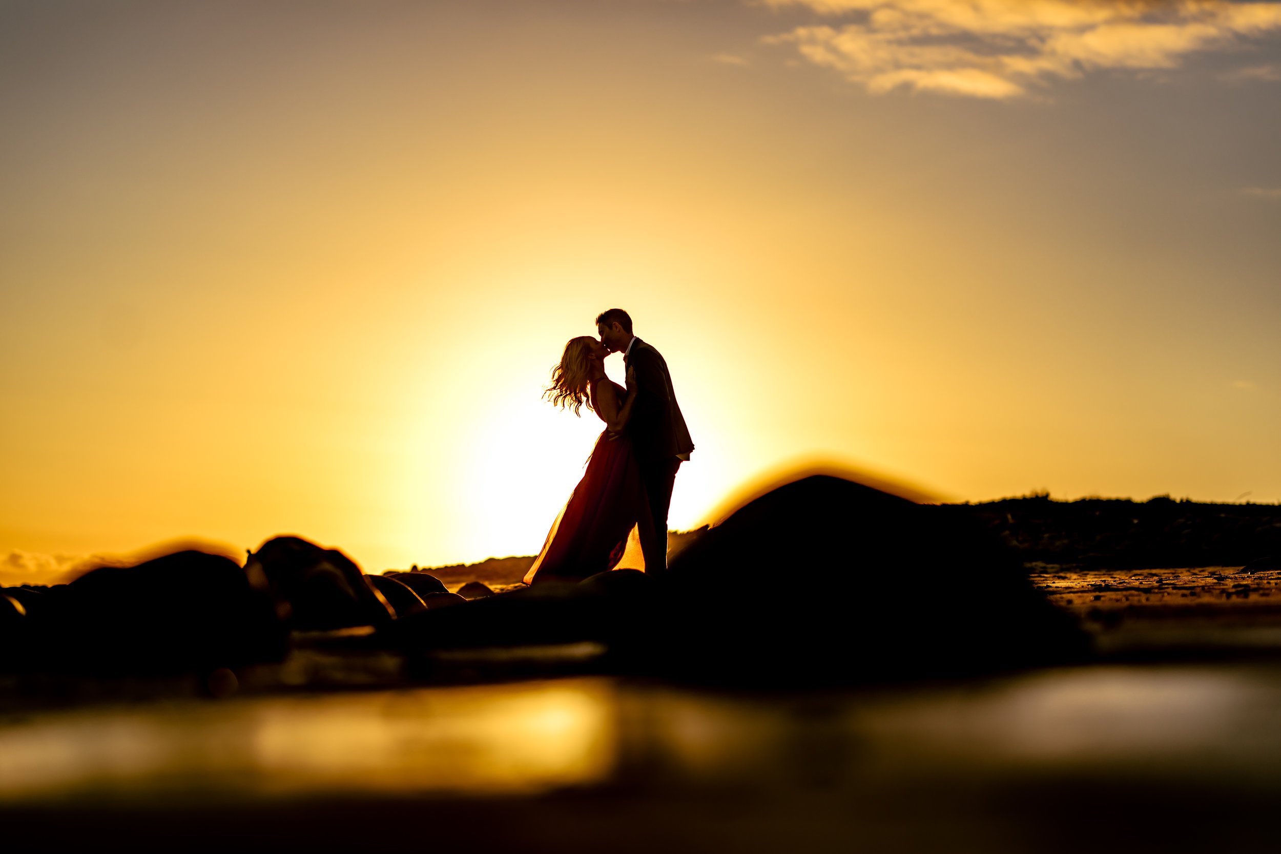 santabarbarawedding.com | Rewind Photography | Butterfly Beach | Engaged Couple on Beach at Sunset