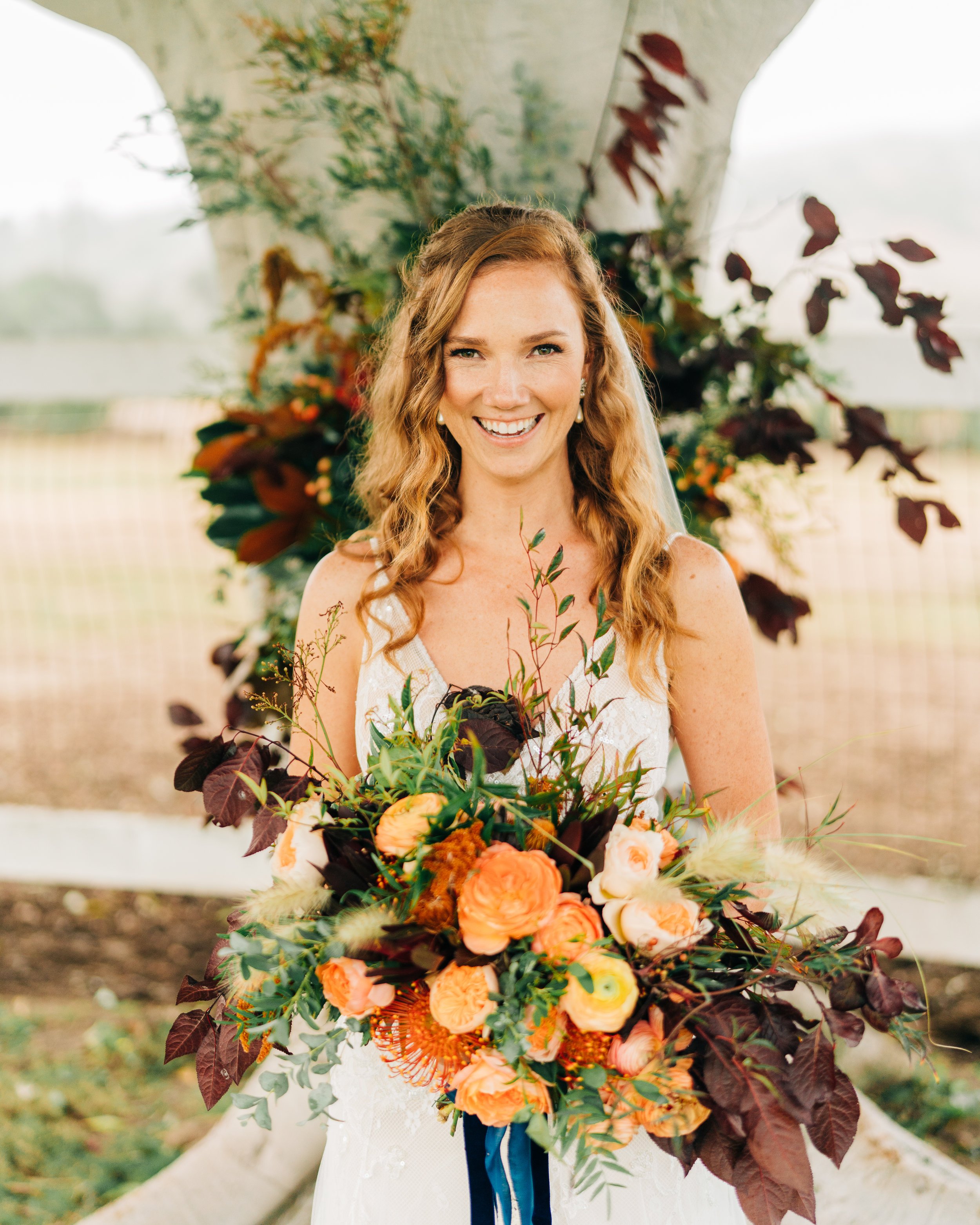 www.santabarbarawedding.com | Brandon Bibbins Photography | The Cottages at Polo Run | Christina Welch Floral | Bride Holds Bouquet