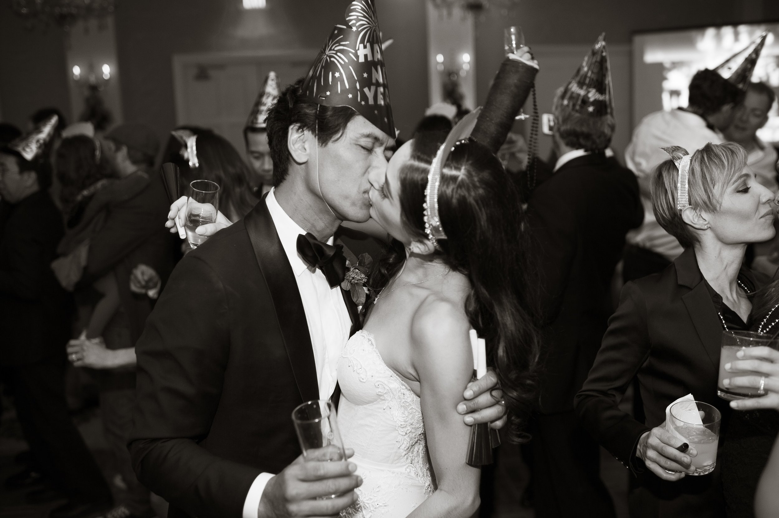 www.santabarbarawedding.com | New Years Eve Wedding | Nate and Jenny | Felici Events | Belmond El Encanto | Black and White | Bride and Groom Kiss