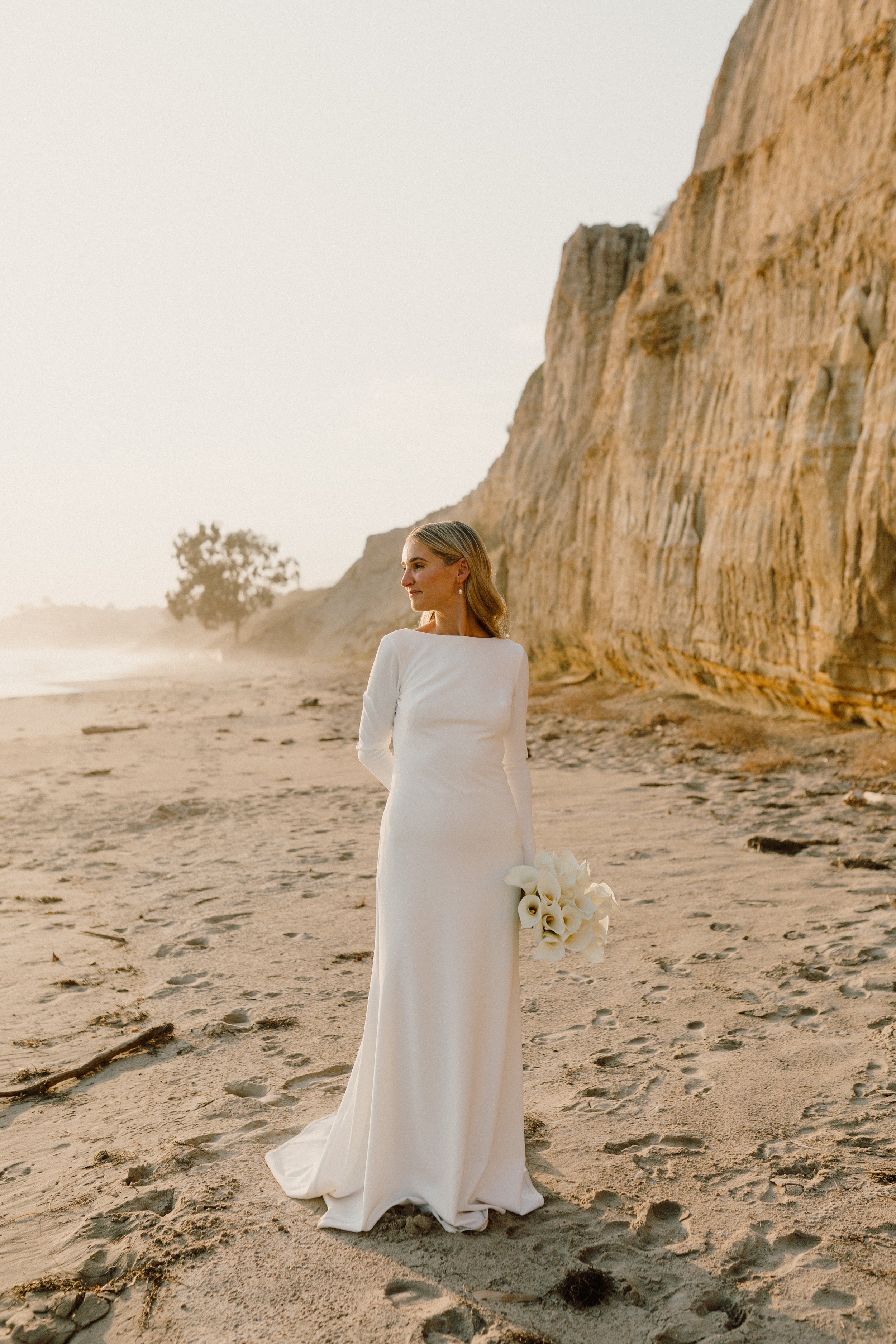 www.santabarbarawedding.com | Nicole Donnelly | Rosewood Miramar Beach | Alpha Floral | BHLDN | On Location Glam | Bride Staring Out at the Water