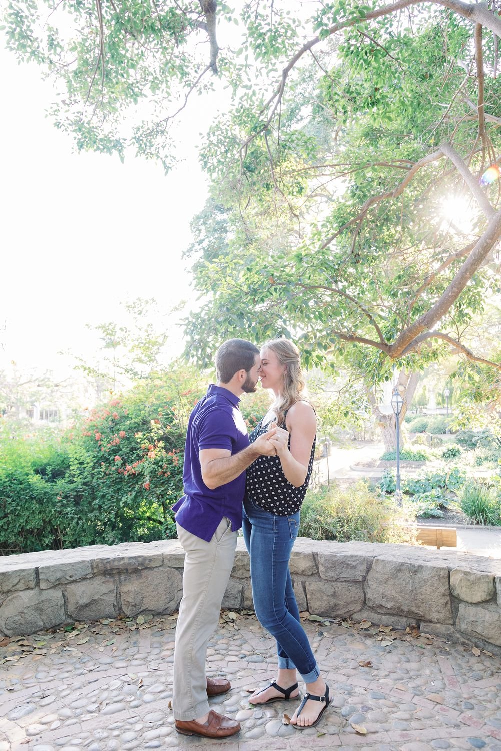 www.santabarbarawedding.com | Renoda Campbell Photography | Couple Embracing in the Park at Santa Barbara Engagement Shoot