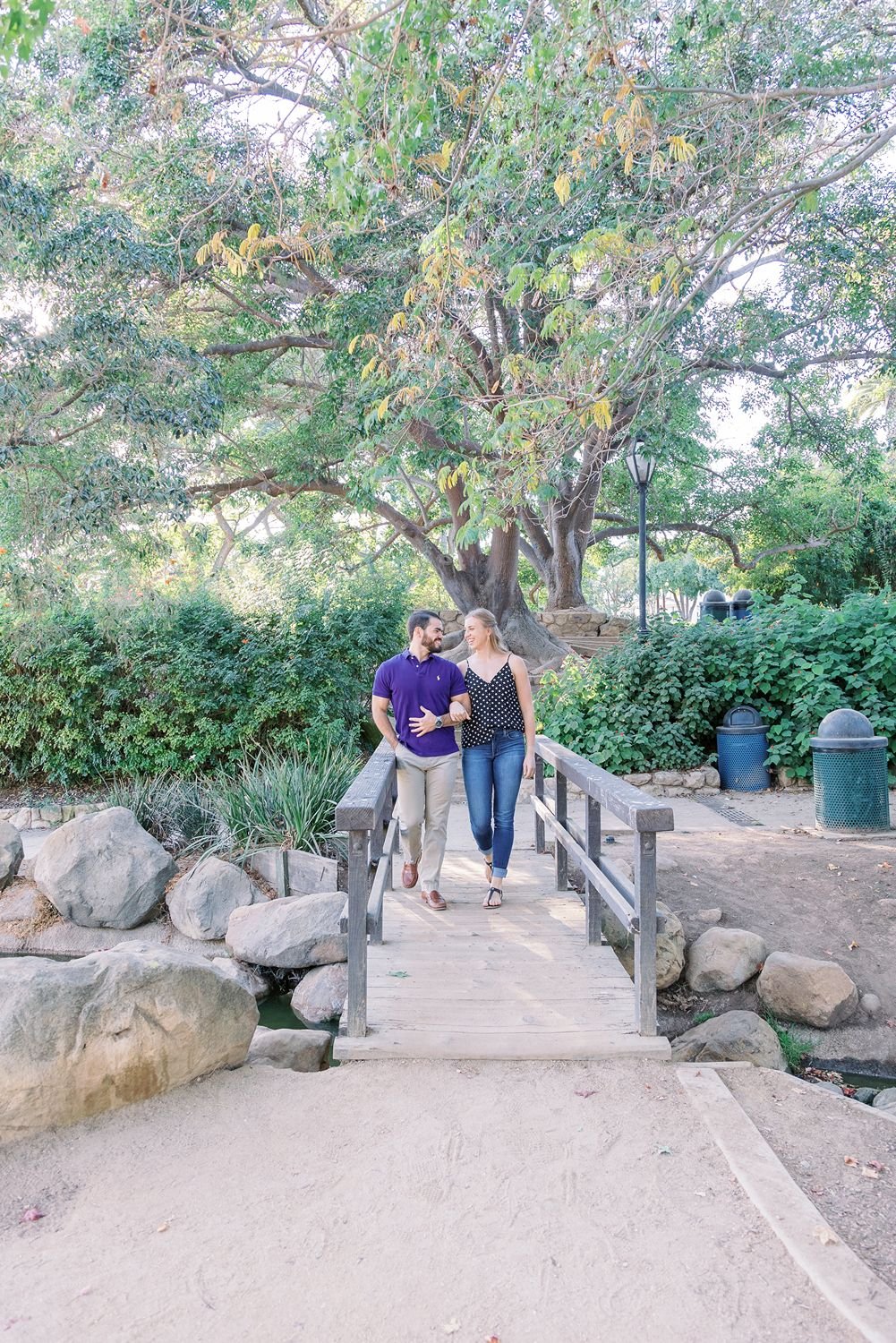 www.santabarbarawedding.com | Renoda Campbell Photography | Couple Walking Across Bridge at Santa Barbara Engagement Shoot