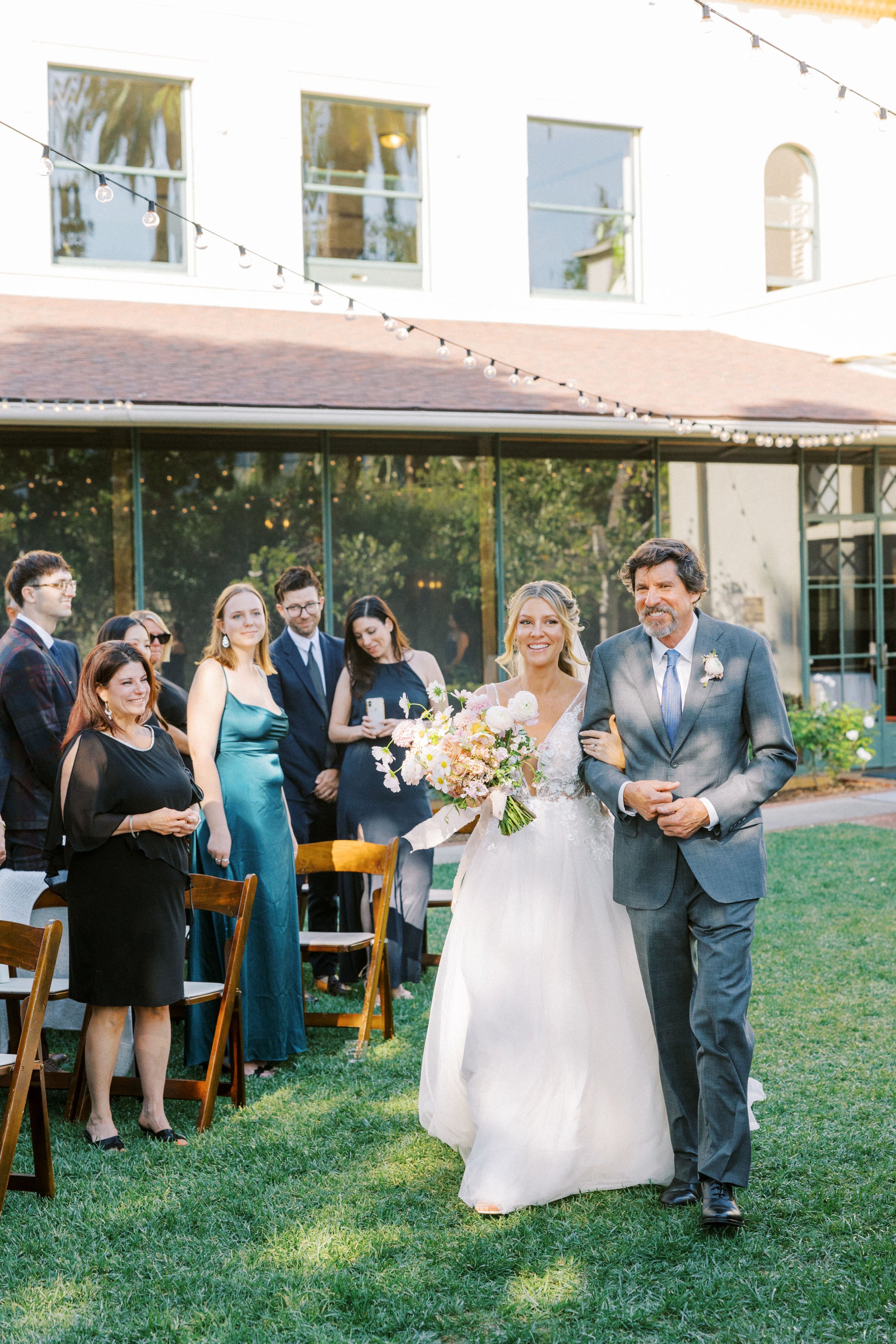 www.santabarbarawedding.com | The Santa Barbara Club | Jen Rodriguez | Gatherings for Good | Blooms by Melly | Under the Veils | Bride Walking Down the Aisle with Father