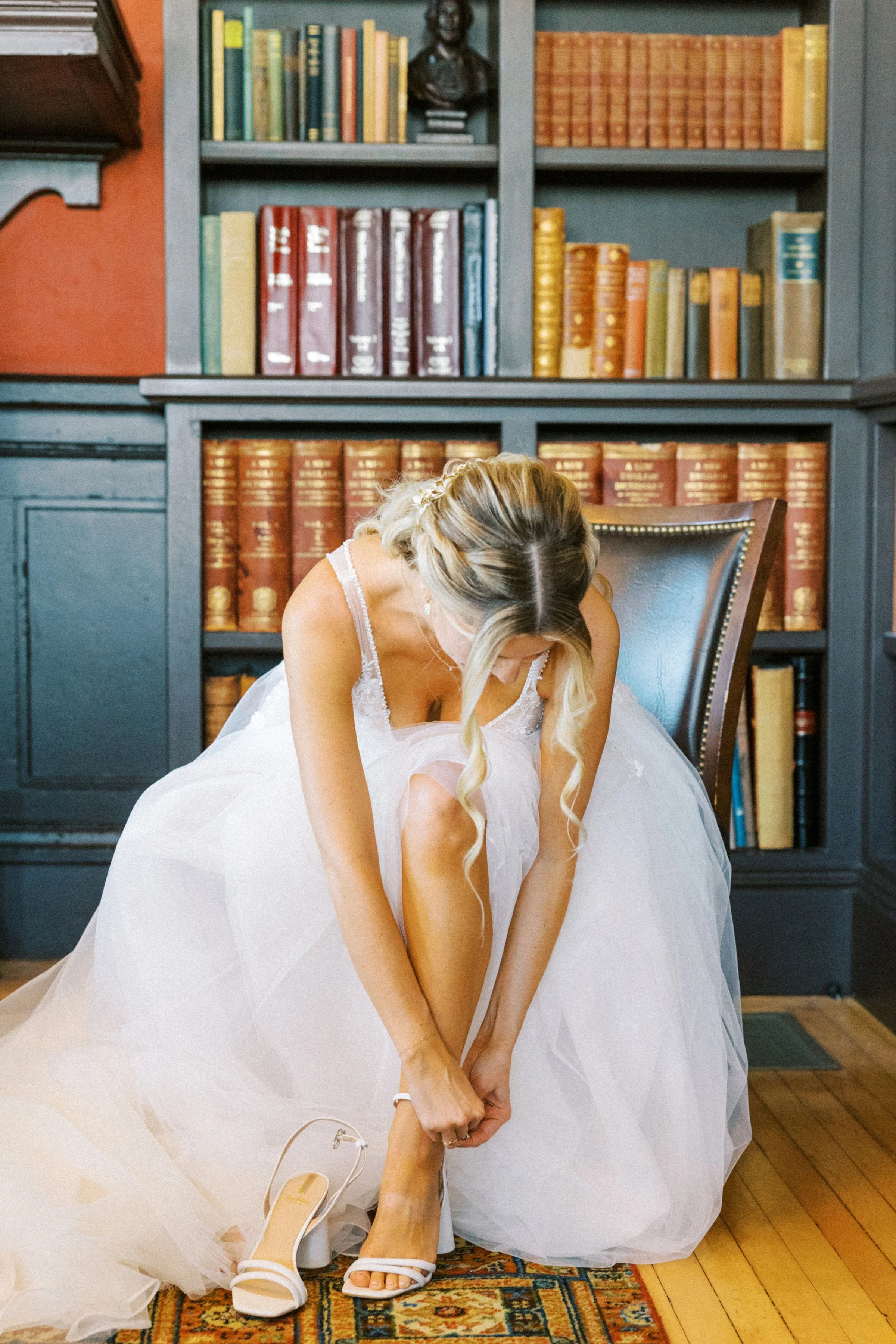 www.santabarbarawedding.com | The Santa Barbara Club | Jen Rodriguez | Gatherings for Good | Blooms by Melly | Under the Veils | Bride Putting on Her Shoes