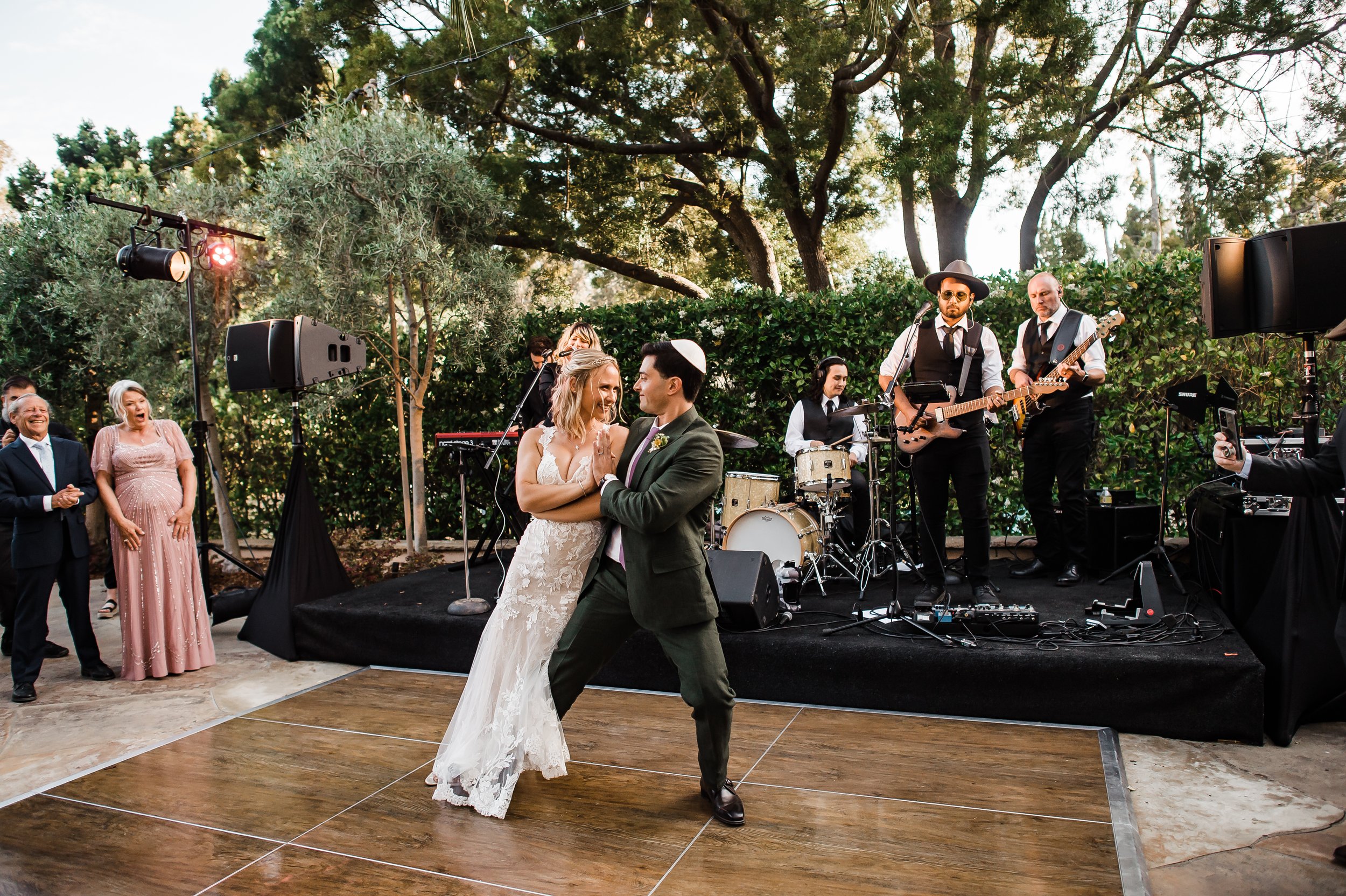 www.santabarbarawedding.com | Michelle Ramirez | Pamela Glavin | The Replicas Music | Couple Dancing at Wedding Reception with Band in the Background