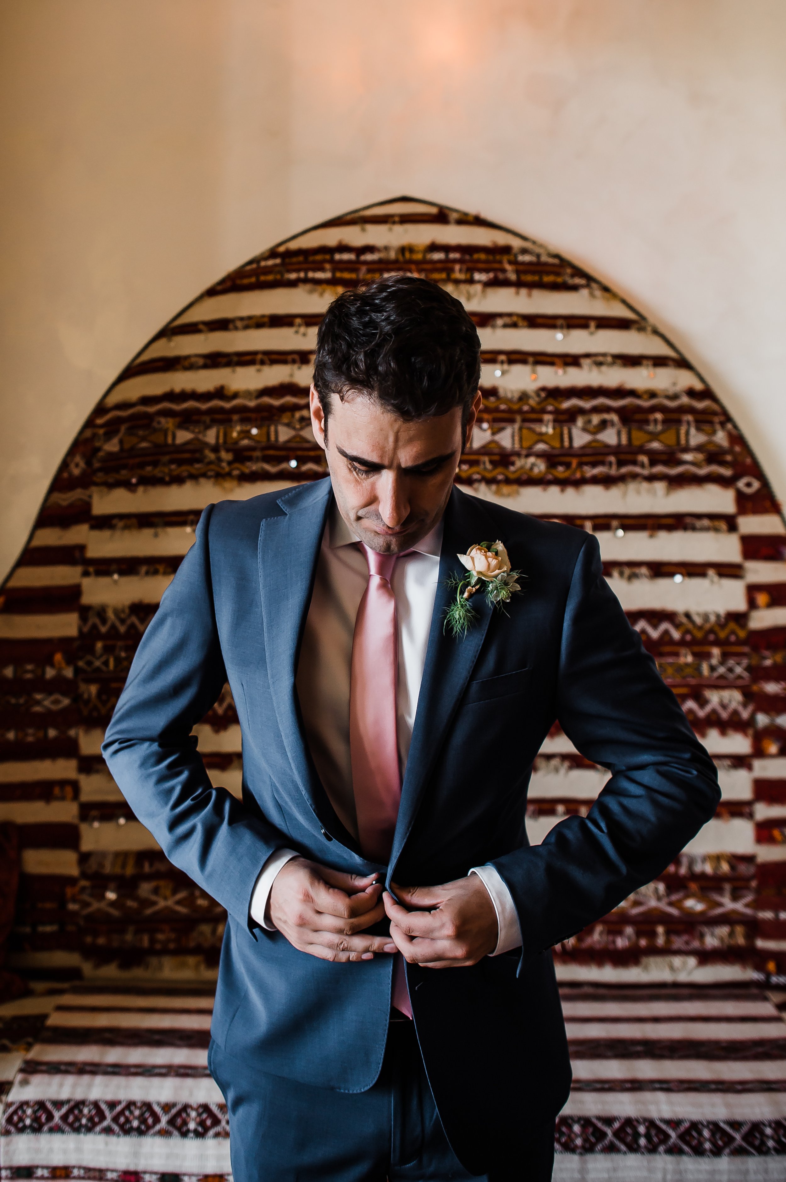 www.santabarbarawedding.com | Michelle Ramirez | Montecito Club | Felici Events | Antheia Floral Design | Groom Putting on His Suit