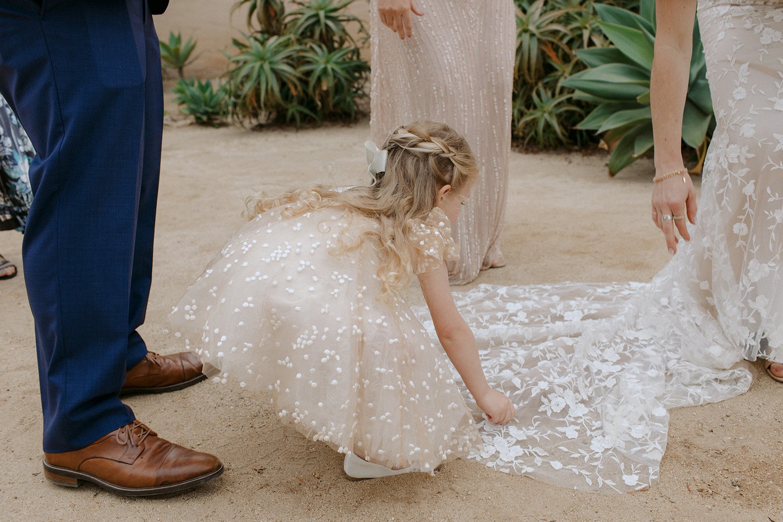  www.santabarbarawedding.com | SB Historical Museum | Ali Beck Photography | Ashley Chanel Events | Ella &amp; Louie | Cheek to Cheek Artistry | Flower Girl Fixing Bride’s Train