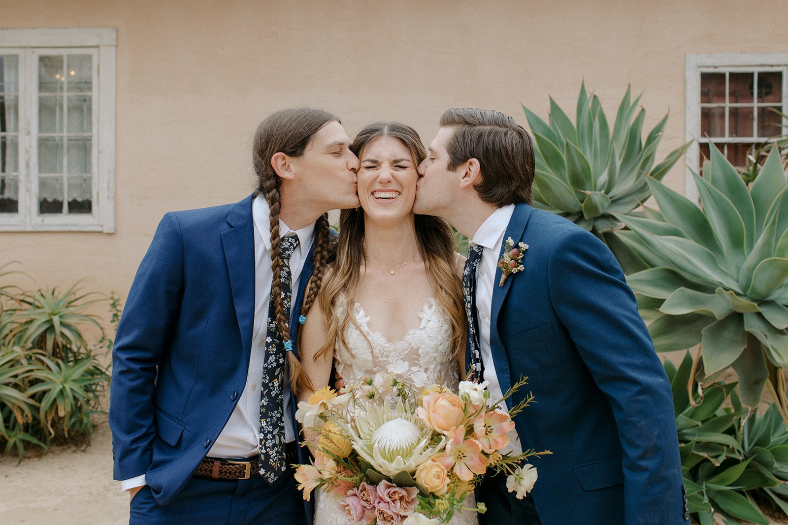  www.santabarbarawedding.com | SB Historical Museum | Ali Beck Photography | Ashley Chanel Events | Ella &amp; Louie | Cheek to Cheek Artistry | Groomsmen Kissing Bride on the Cheek