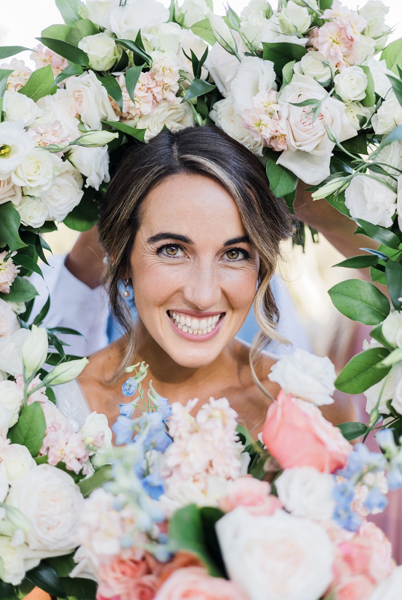 www.santabarbarawedding.com | RG Photography | Events by Fran | Godric Grove | Tangled Lotus | Bride’s Face Surrounded by Pastel Florals