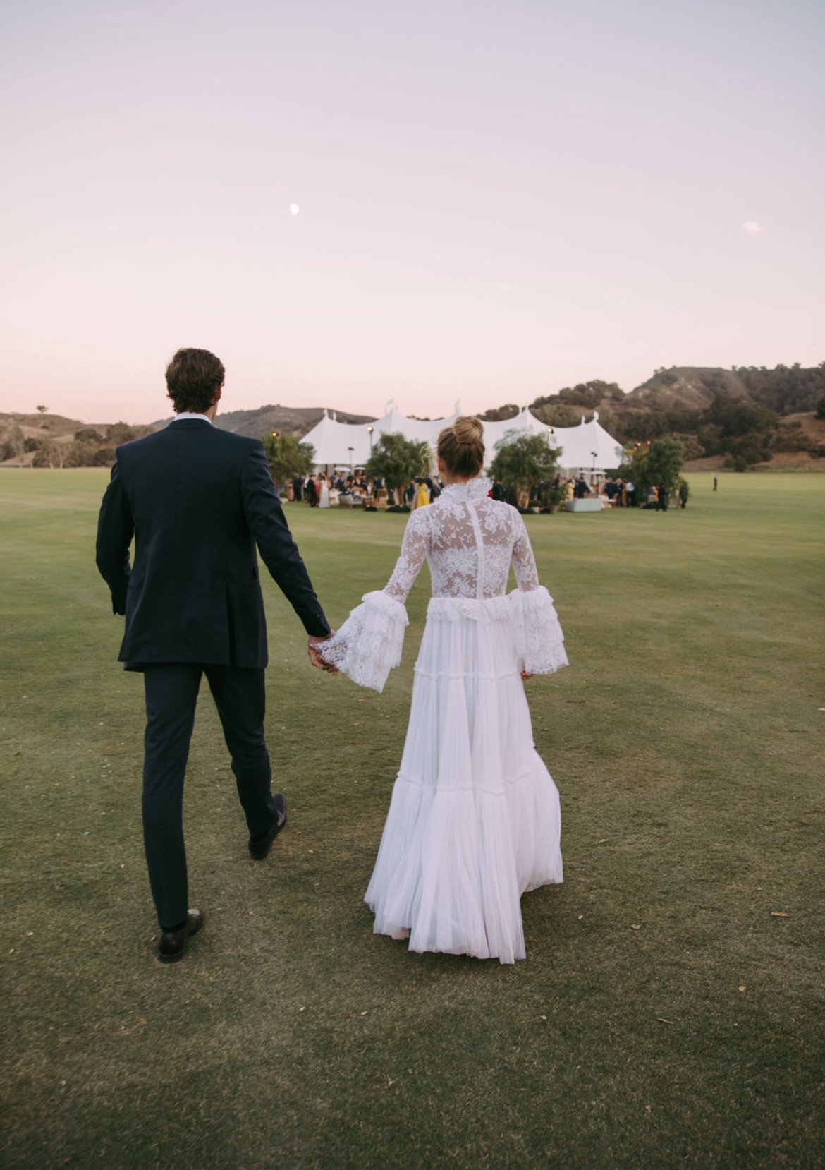 www.santabarbarawedding.com | Happy Canyon Vineyards | Bride and Groom Leaving Ceremony at Venue