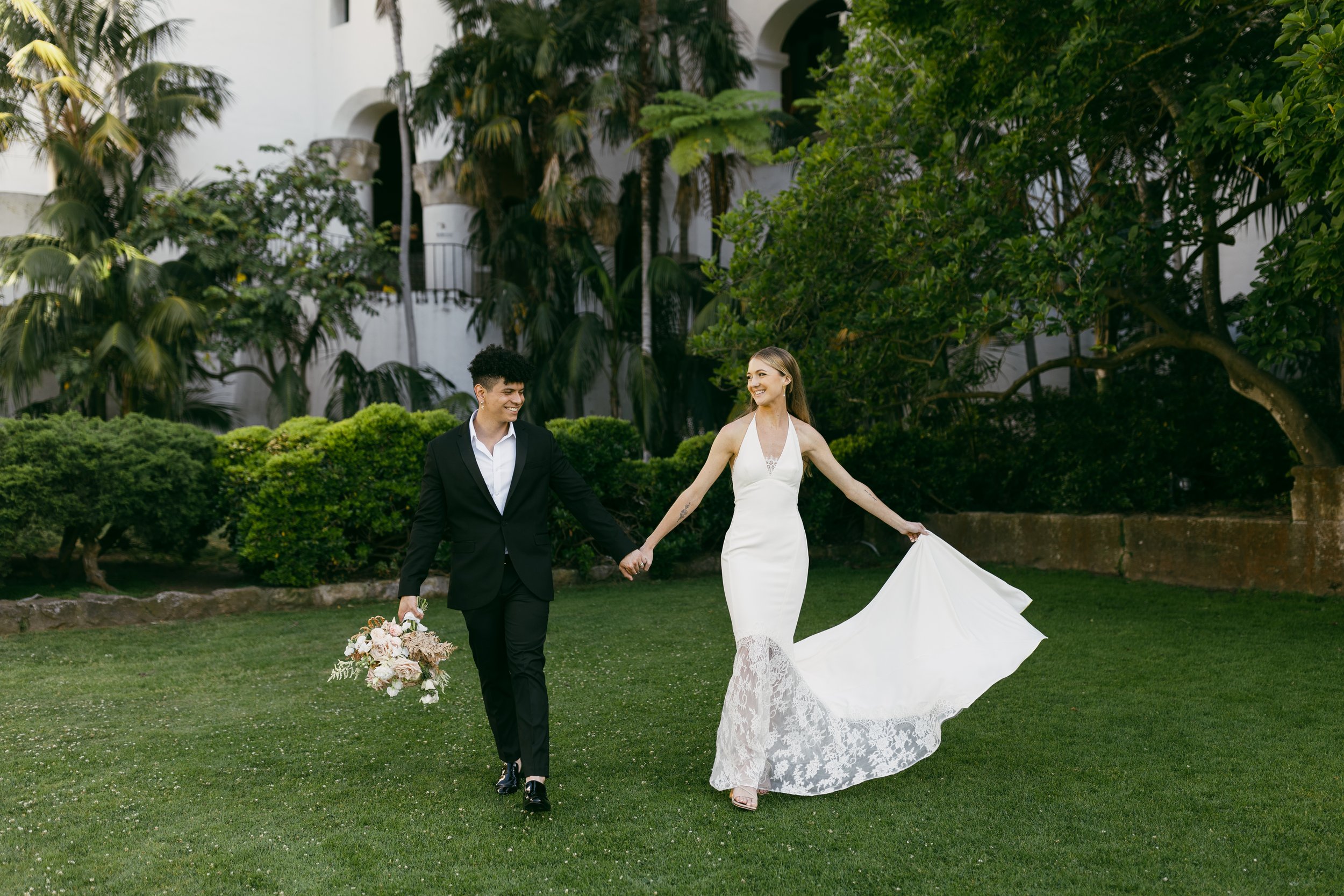 www.santabarbarawedding.com | Taylor Stuck Photography | Santa Barbara Courthouse | Fleur De Rye | Brides for a Cause | Eryka De Santi | ASOS | Bride and Groom On Lawn