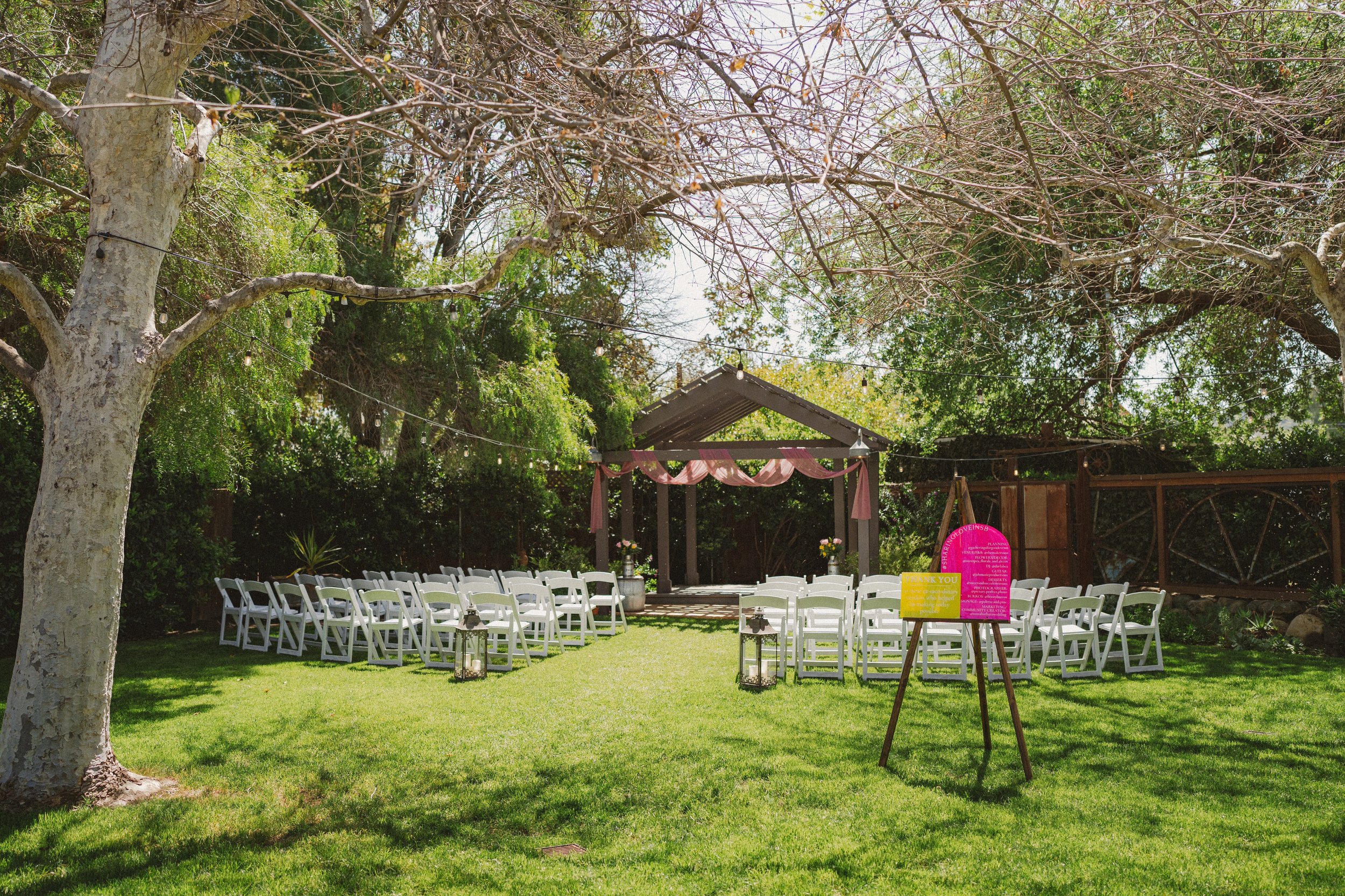 www.santabarbarawedding.com | The Maker’s Son | Gatherings for Good | Picture Perfect Photo | Sweetpea Florals and Decor | Palette &amp; Pine | Ceremony Set Up and Colorful Sign