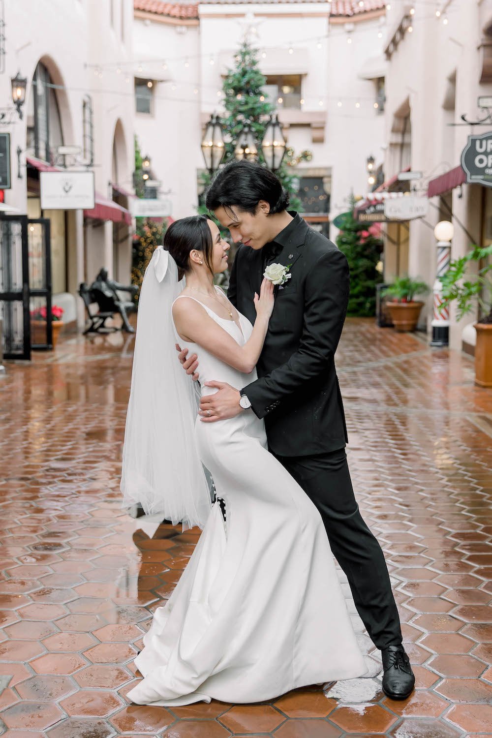 www.santabarbarawedding.com | Weddings by the Sea | Bexx Photography | Bride and Groom Embrace in the Rain